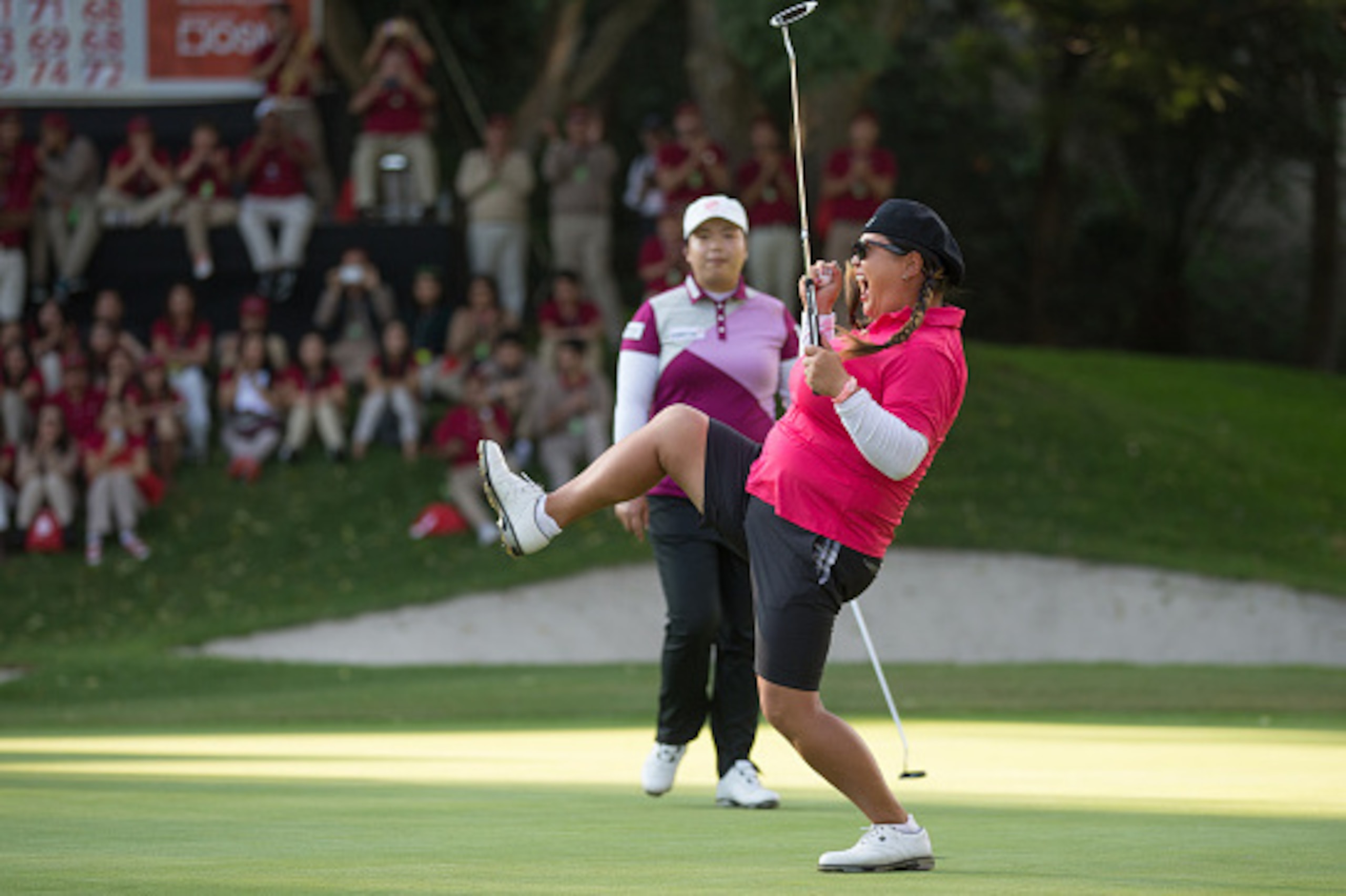 MEXICO CITY, MEXICO - NOVEMBER 16:  Christina Kim of the United States celebrates at the eighteenth hole following her victory in a playoff after the fourth round of the 2014 Lorena Ochoa Invitational presented by Banamex at Club de Golf Mexico on Novembe