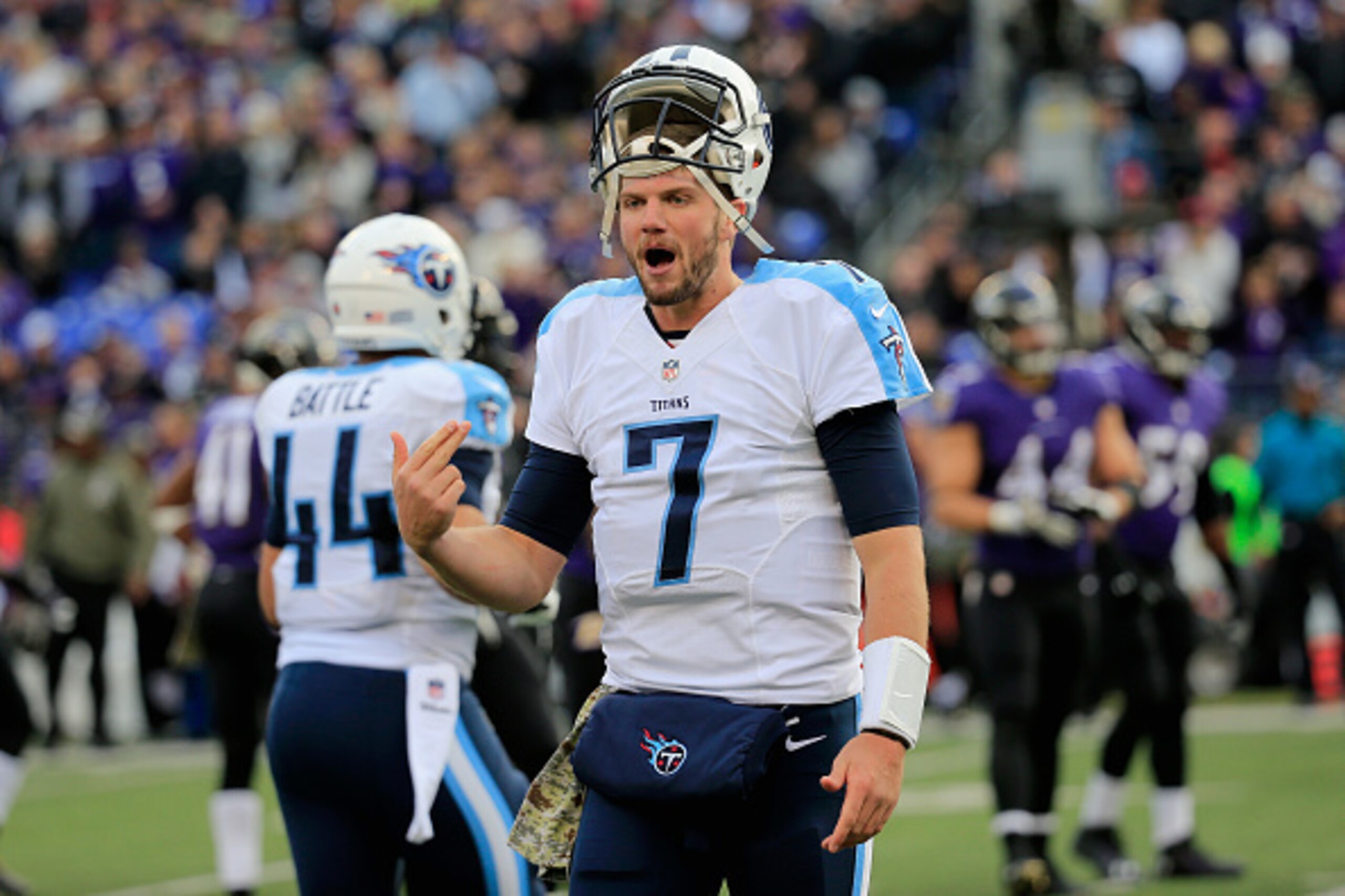 BALTIMORE, MD - NOVEMBER 09: Quarterback Zach Mettenberger #7 of the Tennessee Titans gestures to the sideline during the second half of a game against the Baltimore Ravens at M&T Bank Stadium on November 9, 2014 in Baltimore, Maryland.  (Photo by Rob Car