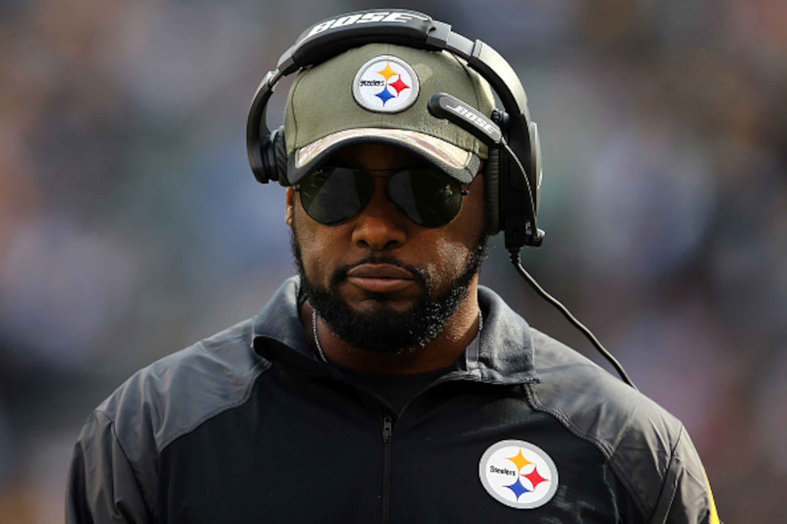 EAST RUTHERFORD, NJ - NOVEMBER 09:  Head coach Mike Tomlin of the Pittsburgh Steelers looks on from the sideline against the New York Jets during a game at MetLife Stadium on November 9, 2014 in East Rutherford, New Jersey.  (Photo by Elsa/Getty Images)