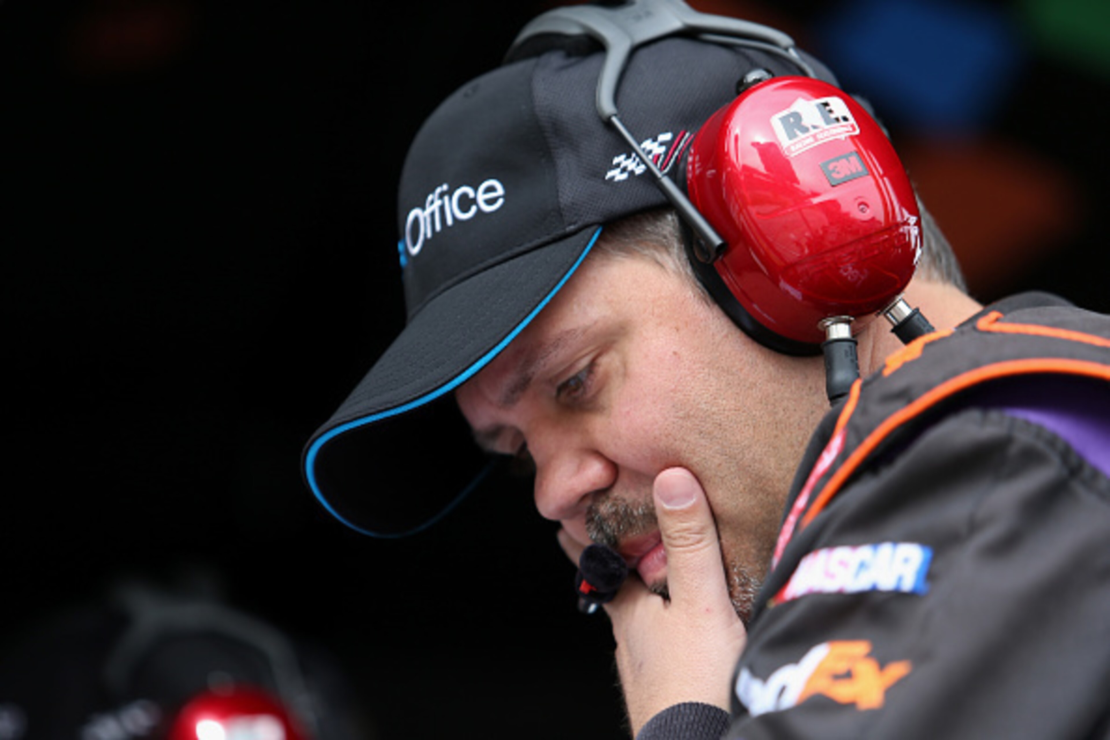 FORT WORTH, TX - NOVEMBER 02:  Crew chief for Denny Hamlin, driver of the #11 FedEx Office Toyota, Darian Grubb looks on during the NASCAR Sprint Cup Series AAA Texas 500 at Texas Motor Speedway on November 2, 2014 in Fort Worth, Texas.  (Photo by Todd Wa