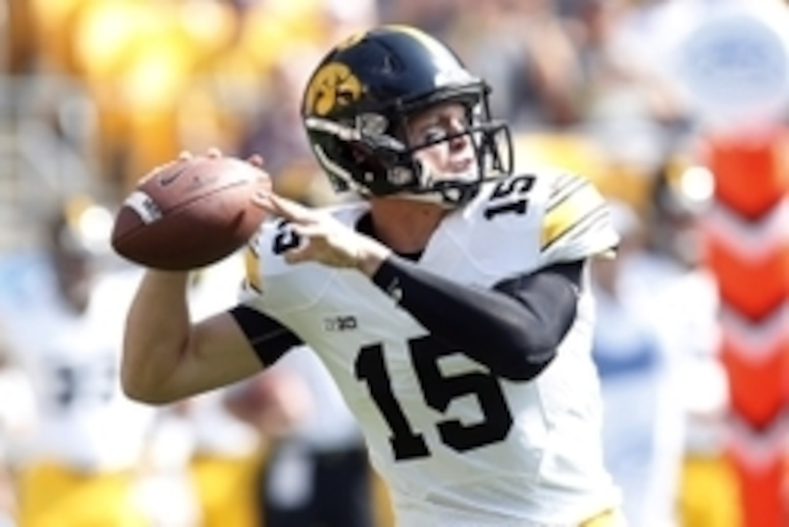 Sep 20, 2014; Pittsburgh, PA, USA; Iowa Hawkeyes quarterback Jake Rudock (15) passes the ball against the Pittsburgh Panthers during the first quarter at Heinz Field. Mandatory Credit: Charles LeClaire-USA TODAY Sports