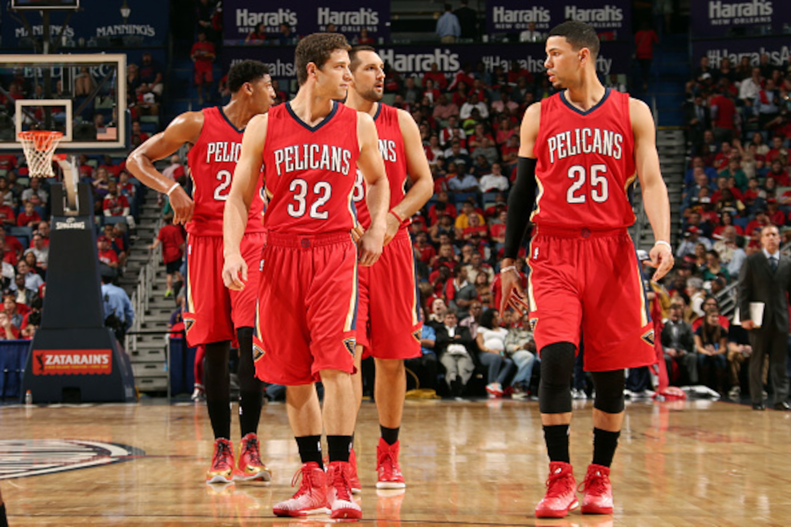 NEW ORLEANS, LA - OCTOBER 28: Jimmer Fredette #32 and Austin Rivers #25 of the New Orleans Pelicans speak during a game against the Orlando Magic on October 28, 2014 at Smoothie King Center in New Orleans, LA. NOTE TO USER: User expressly acknowledges and