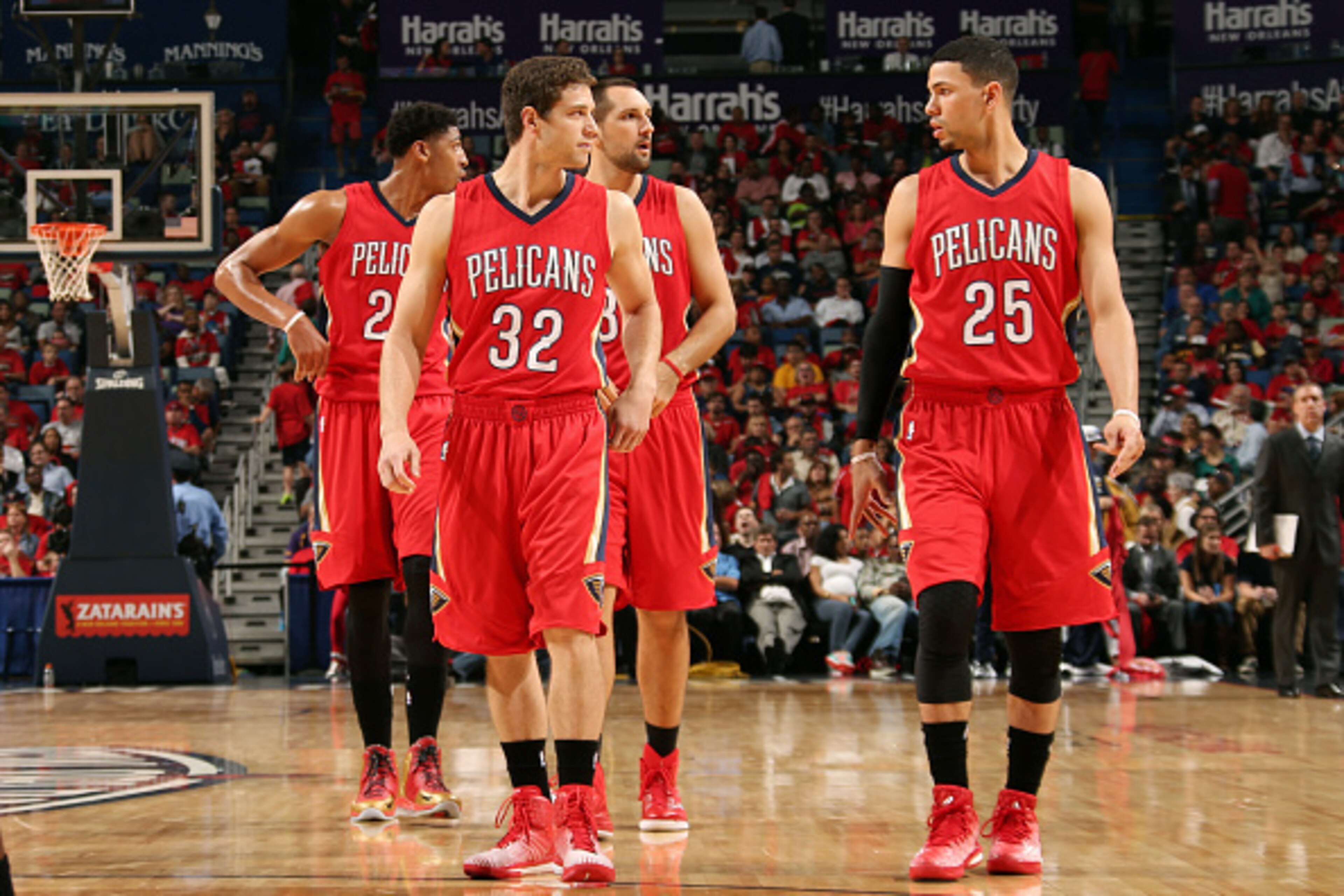 NEW ORLEANS, LA - OCTOBER 28: Jimmer Fredette #32 and Austin Rivers #25 of the New Orleans Pelicans speak during a game against the Orlando Magic on October 28, 2014 at Smoothie King Center in New Orleans, LA. NOTE TO USER: User expressly acknowledges and