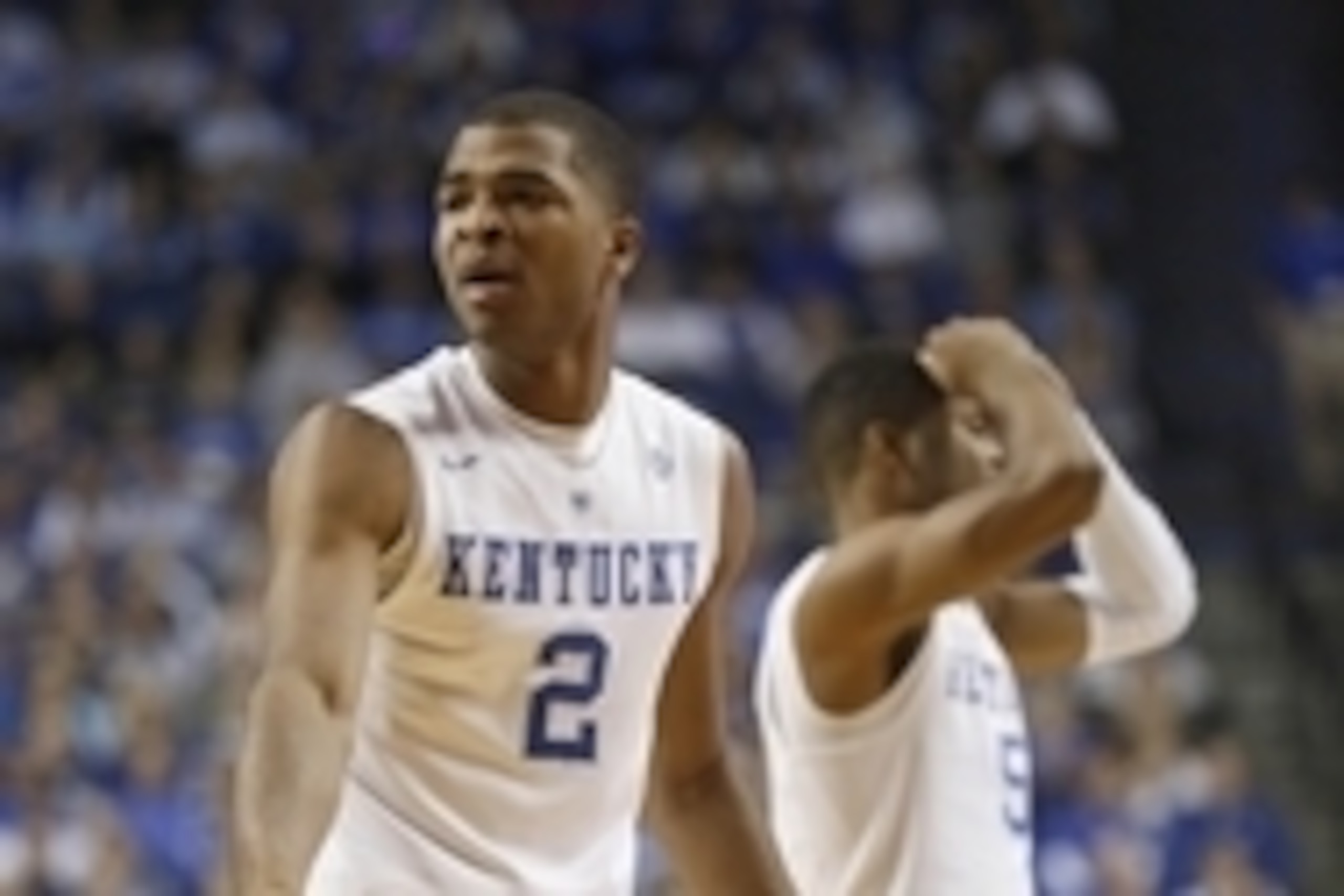 Nov 16, 2014; Lexington, KY, USA; Kentucky Wildcats guard Aaron Harrison (2) and guard Andrew Harrison (5) react to a call during the game against the Buffalo Bulls in the second half at Rupp Arena. Mandatory Credit: Mark Zerof-USA TODAY Sports