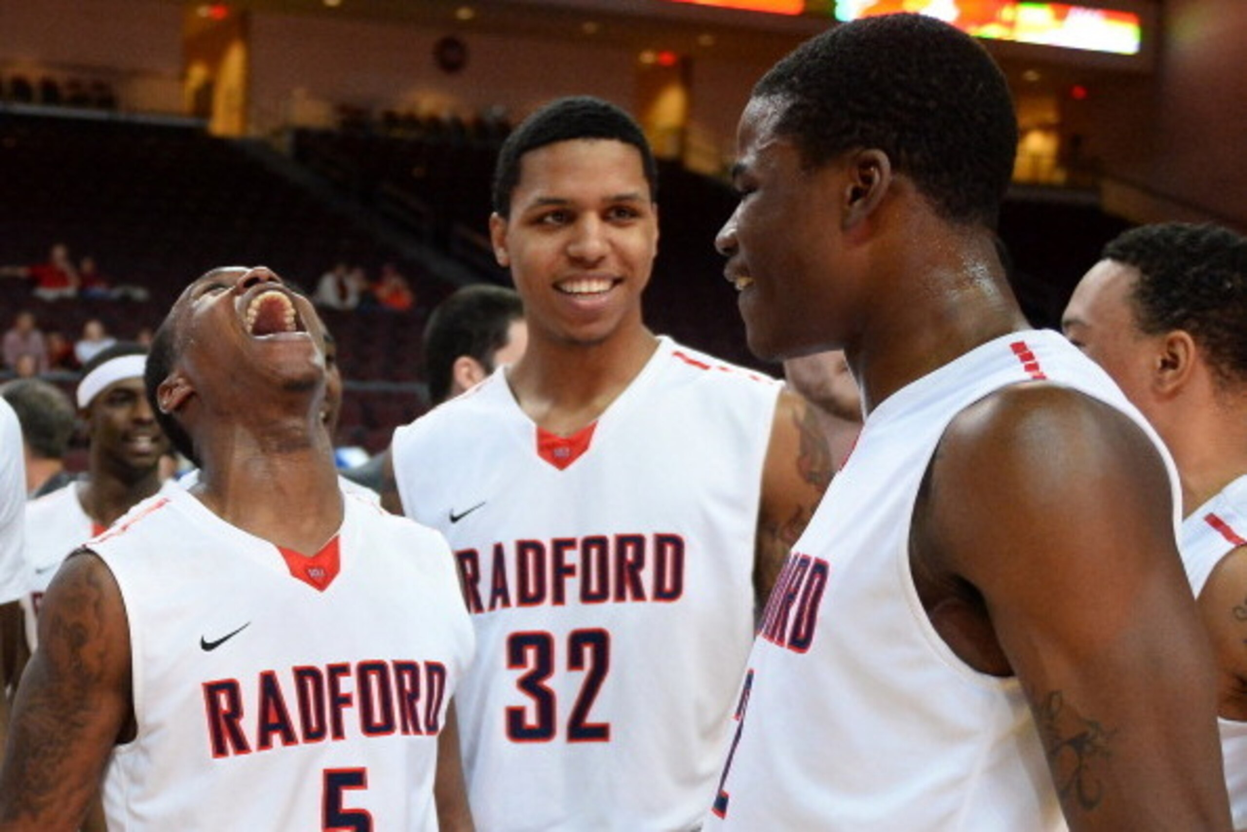 LAS VEGAS, NV - DECEMBER 23:  Rashun Davis #5, Juwan Wells #32 and Javonte Green #2 of the Radford Highlanders celebrate their 64-63 victory over the Florida Gulf Coast Eagles during the 2013 Continental Tire Las Vegas Classic at the Orleans Arena on Dece
