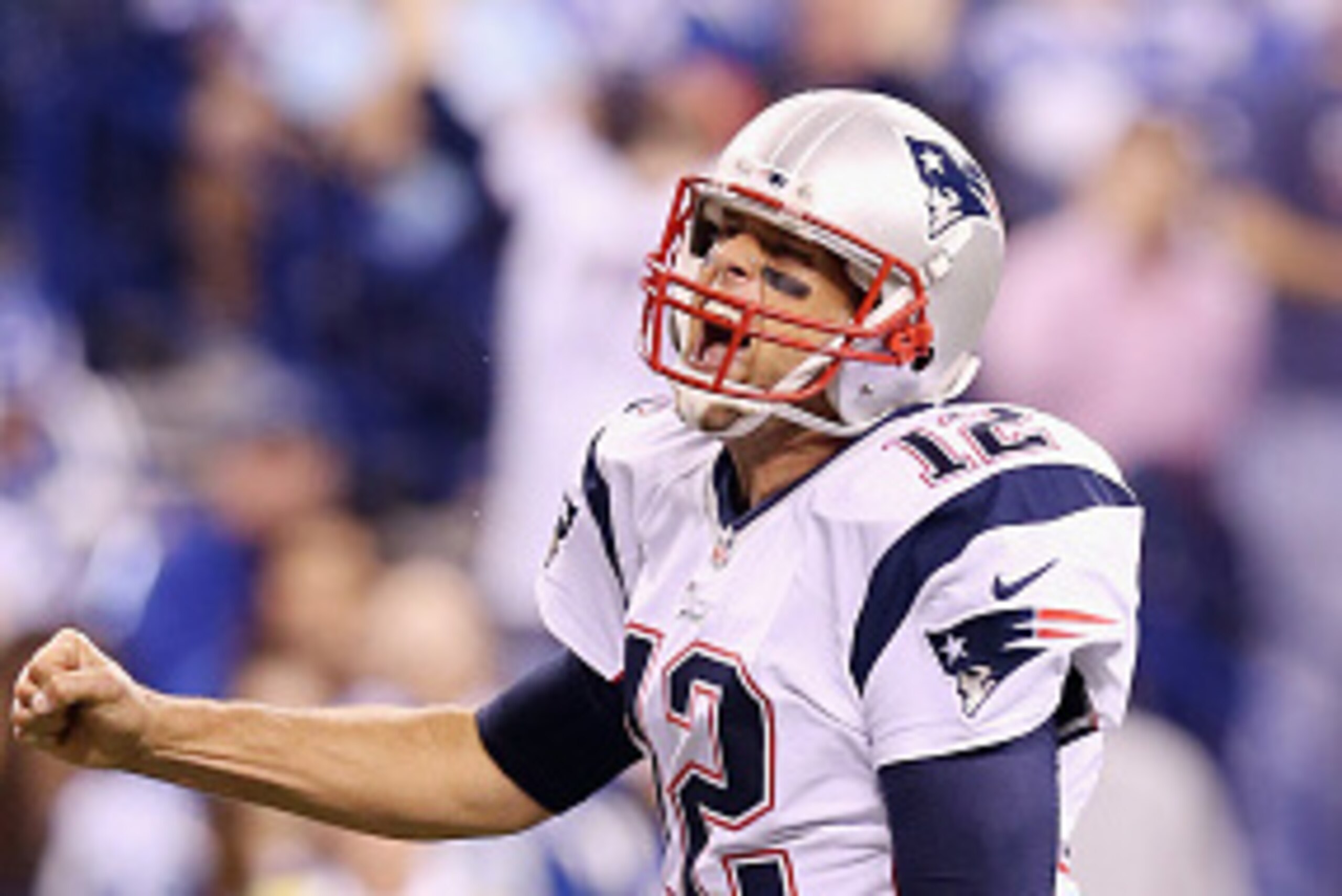 INDIANAPOLIS, IN - NOVEMBER 16: Quarterback  Tom Brady #12 of the New England Patriots celebrates after a touchdown against the Indianapolis Colts during the third quarter of the game at Lucas Oil Stadium on November 16, 2014 in Indianapolis, Indiana.  (P