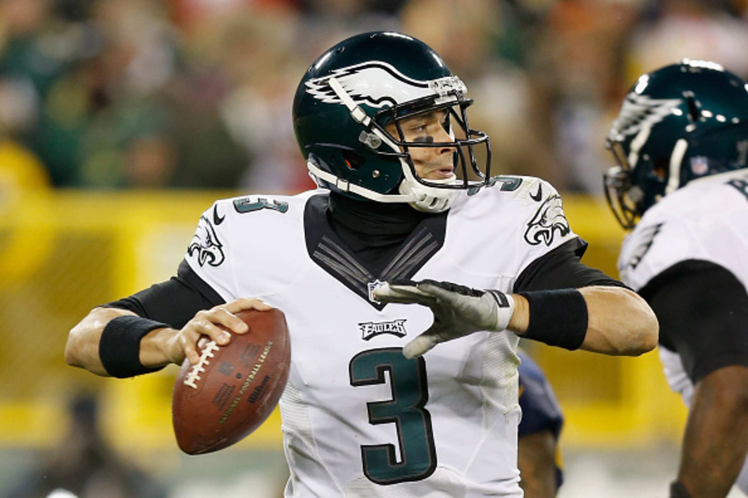 GREEN BAY, WI - NOVEMBER 16:  Quarterback  Mark Sanchez #3 of the Philadelphia Eagles looks to pass against the Green Bay Packers during the third quarter of the game at Lambeau Field on November 16, 2014 in Green Bay, Wisconsin.  (Photo by Mike Zarrilli/