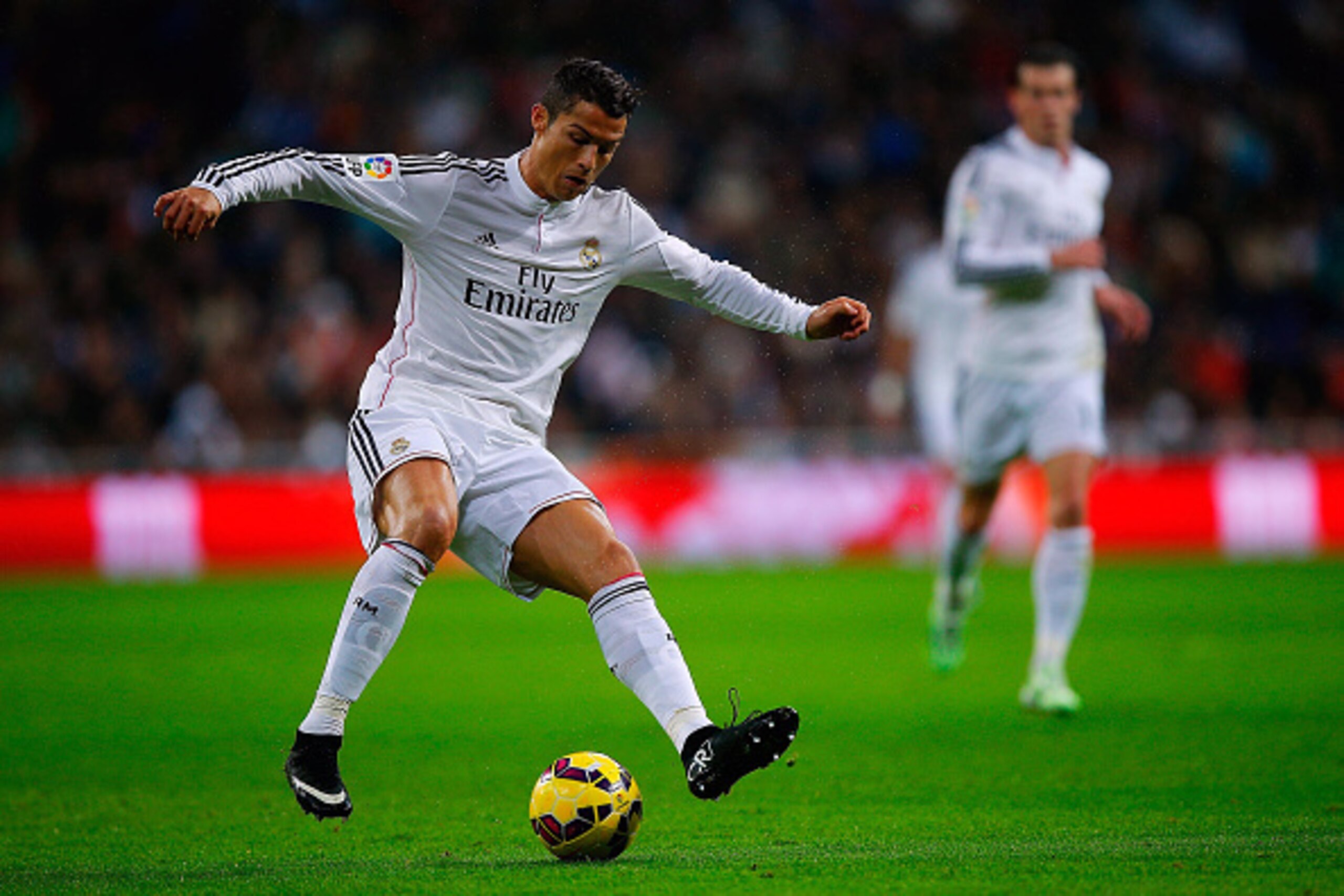 MADRID, SPAIN - NOVEMBER 08: Cristiano Ronaldo of Real Madrid CF controls the ball during the La Liga match between Real Madrid CF and Rayo Vallecano de Madrid at Estadio Santiago Bernabeu on November 8, 2014 in Madrid, Spain. (Photo by Gonzalo Arroyo Mo MADRID, SPAIN - NOVEMBER 08: Cristiano Ronaldo of Real Madrid CF controls the ball during the La Liga match between Real Madrid CF and Rayo Vallecano de Madrid at Estadio Santiago Bernabeu on November 8, 2014 in Madrid, Spain. (Photo by Gonzalo Arroyo Mo