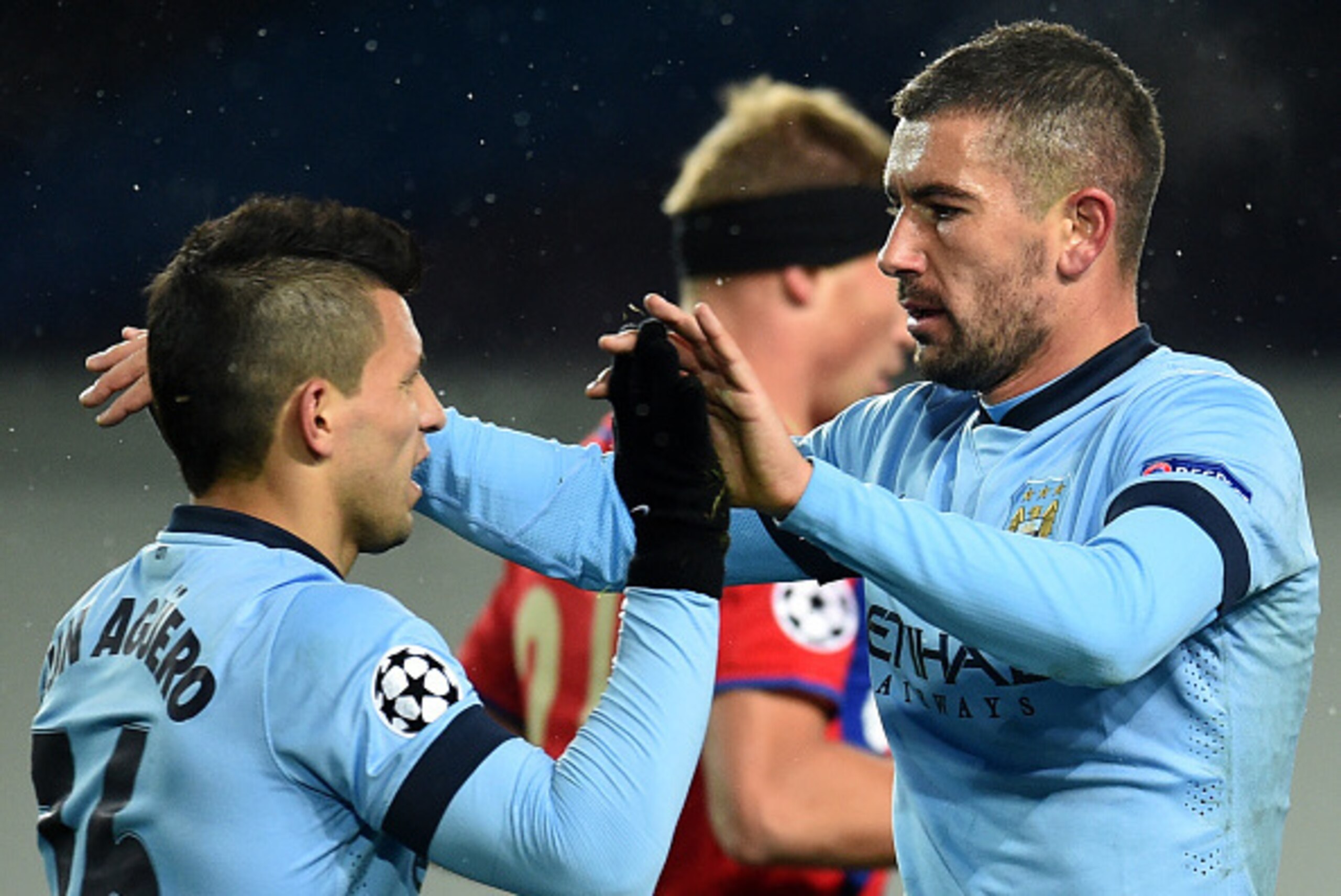 KHIMKI, RUSSIA - OCTOBER 21: Sergio Aguero (L) and Aleksandar Kolarov of Manchester City FC celebrate after scoring a goal during the UEFA Champions League Group E match between PFC CSKA Moscow and Manchester City FC at the Arena Khimki Stadium on October