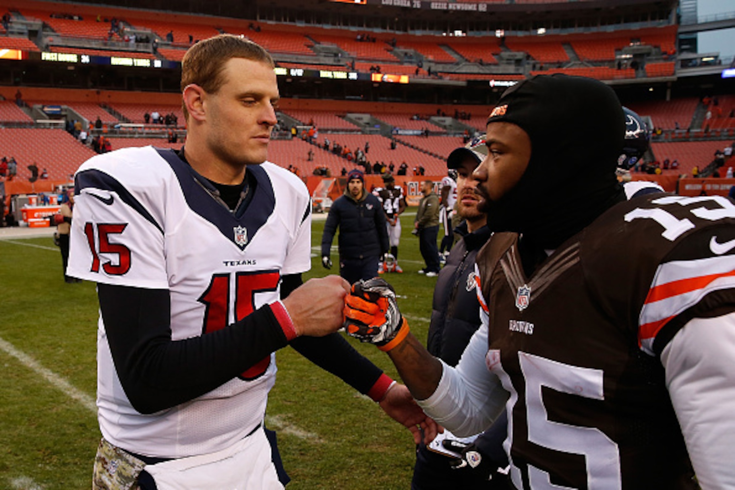 CLEVELAND, OH - NOVEMBER 16:  Ryan Mallett #15 of the Houston Texans is congratulated by Marlon Moore #15 of the Cleveland Browns after Houston's 23-7 win at FirstEnergy Stadium on November 16, 2014 in Cleveland, Ohio.  (Photo by Gregory Shamus/Getty Imag
