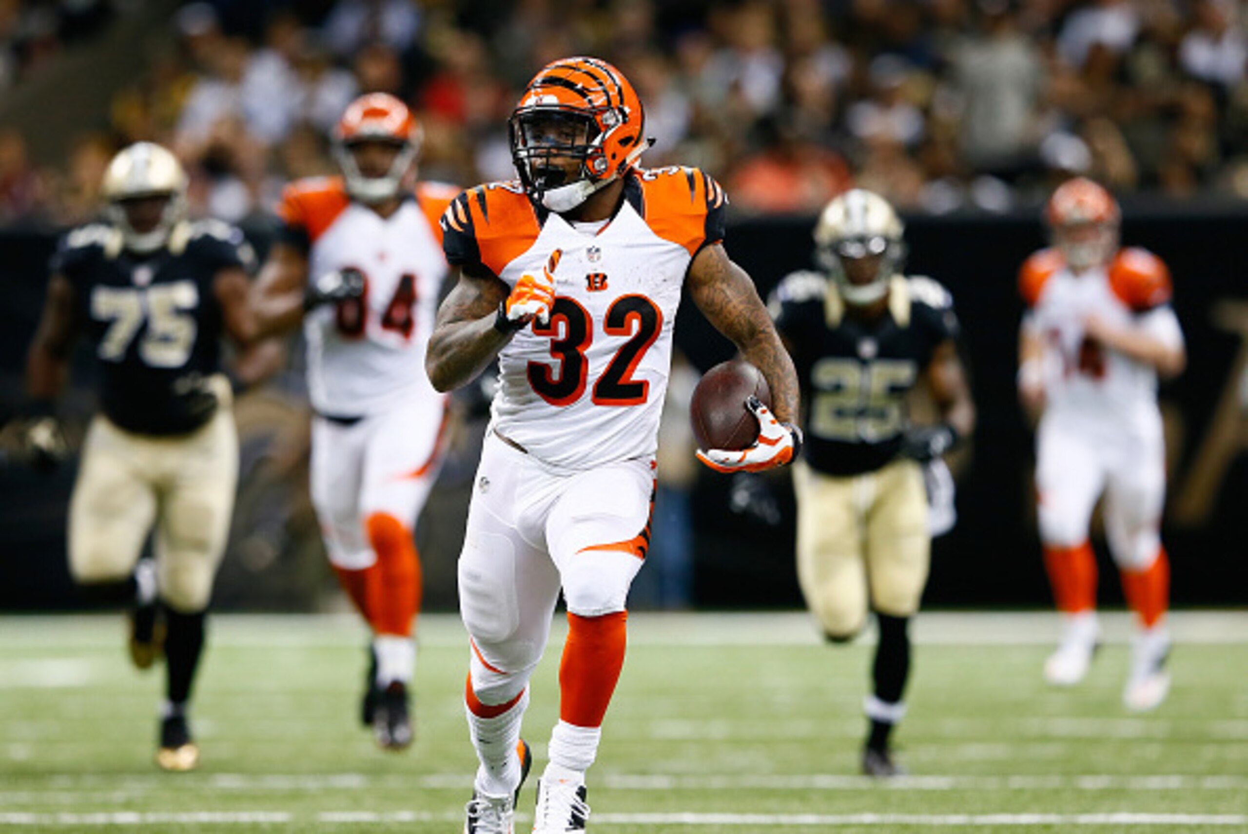NEW ORLEANS, LA - NOVEMBER 16:  Jeremy Hill #32 of the Cincinnati Bengals runs the ball down the field during the second half against the New Orleans Saints at Mercedes-Benz Superdome on November 16, 2014 in New Orleans, Louisiana.  (Photo by Kevin C. Cox