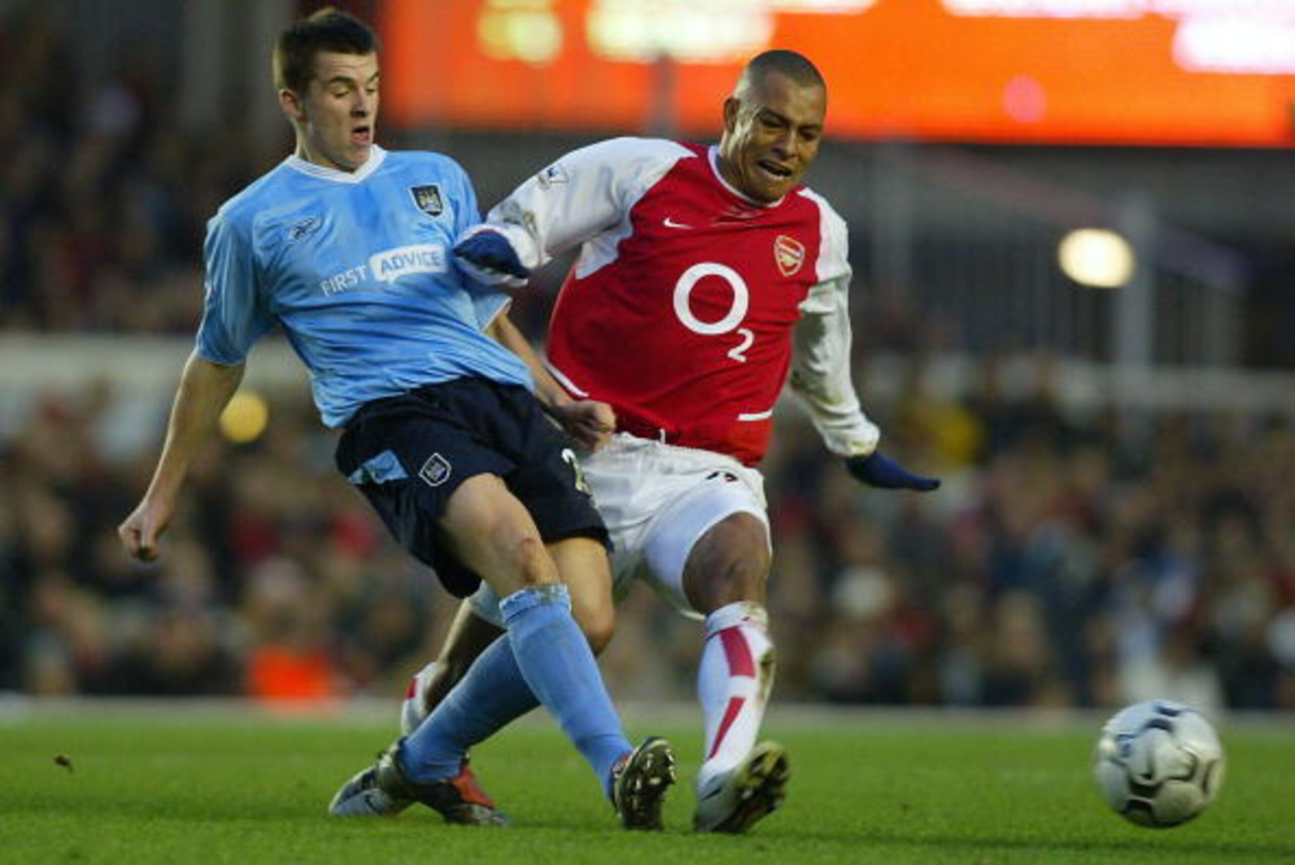LONDON, ENGLAND - FEBRUARY 1: Gilberto Silva of Arsenal tries to tackle Joey Barton of Manchester City during the FA Barclaycard Premiership match between Arsenal and Manchester City at Highbury on February 1, 2004 in London.  (Photo by Ben Radford/Getty 
