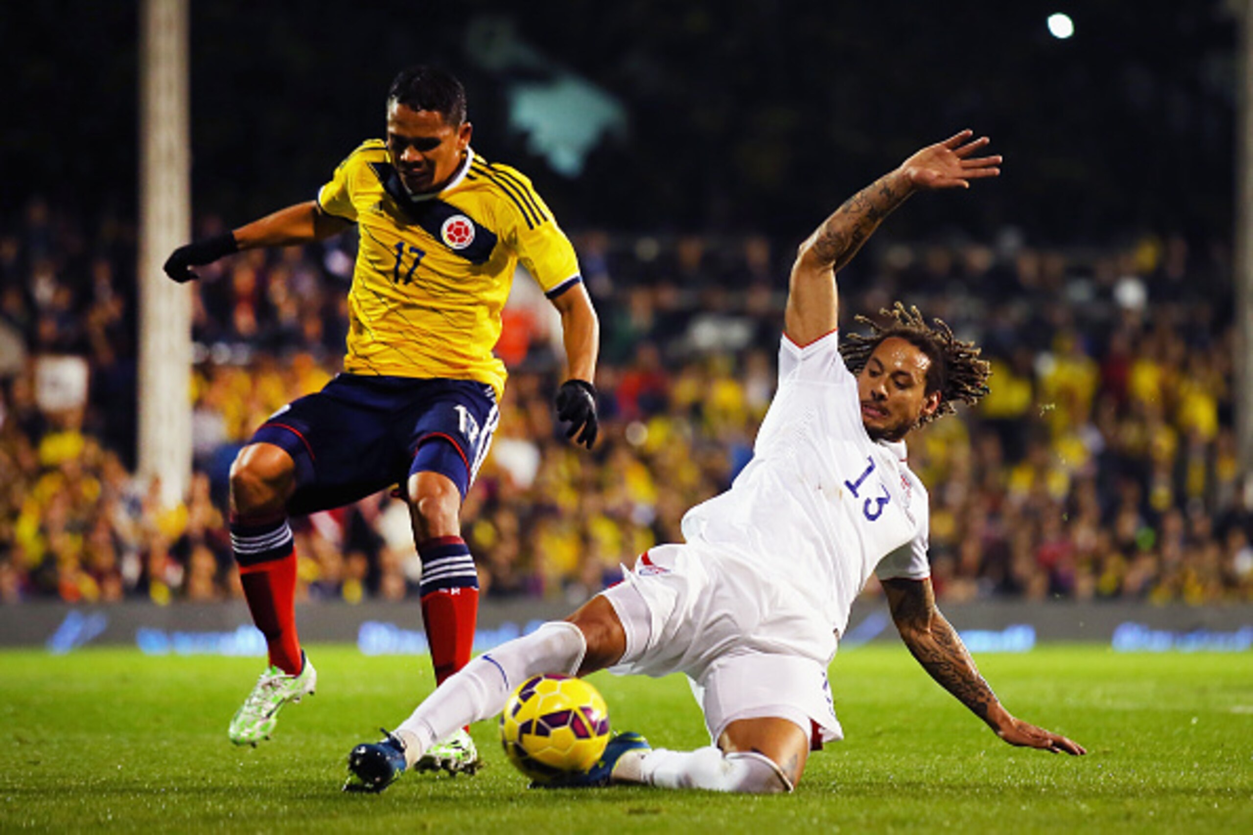 LONDON, ENGLAND - NOVEMBER 14:  Jermaine Jones of the USA avoids Carlos Bacca of Colombia during the International Friendly between the USA and Colombia at Craven Cottage on November 14, 2014 in London, England.  (Photo by Bryn Lennon/Getty Images)