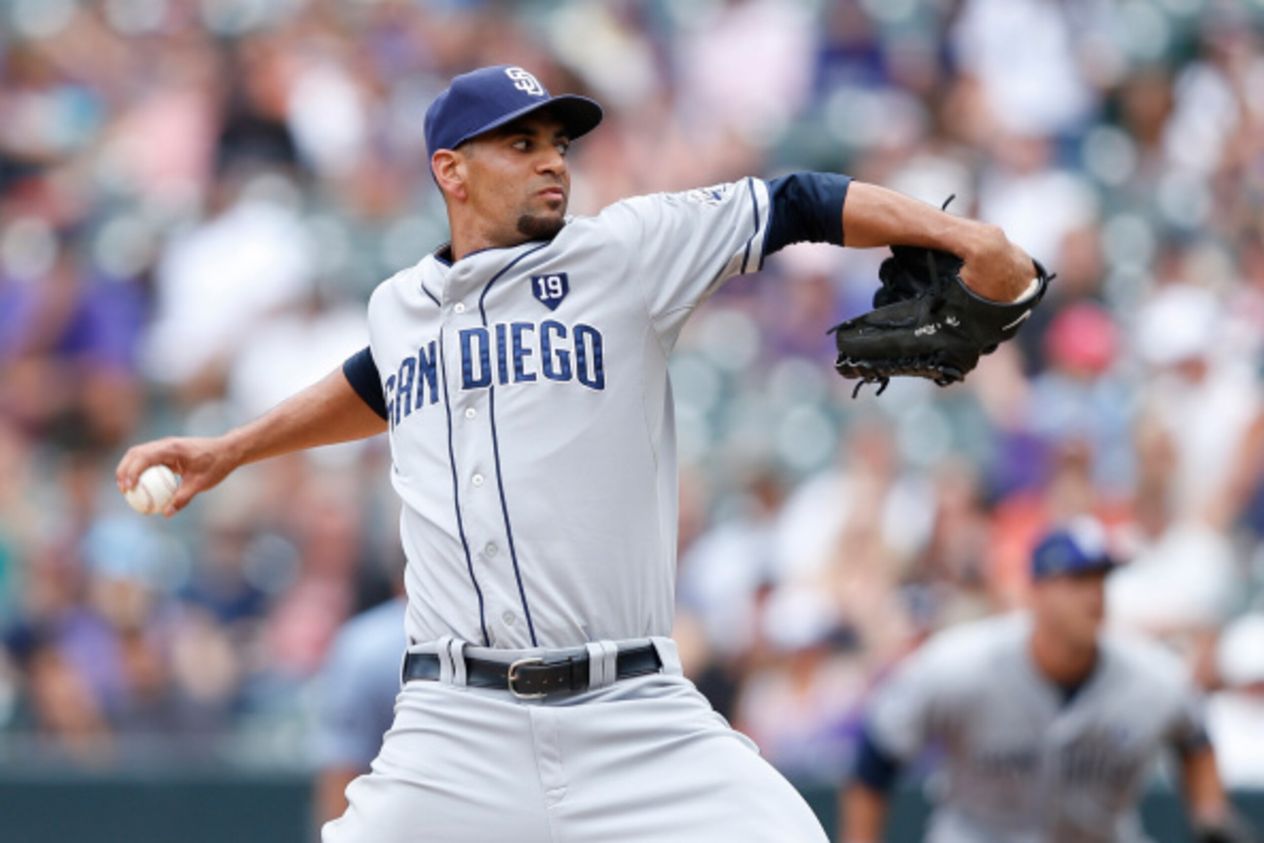 DENVER, CO - SEPTEMBER 7:  Tyson Ross #38 of the San Diego Padres pitches in the second inning of the game against the Colorado Rockies at Coors Field on September 7, 2014 in Denver, Colorado. (Photo by Joe Robbins/Getty Images)