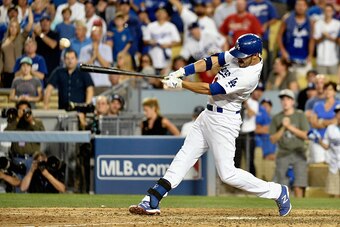 LOS ANGELES, CA - OCTOBER 03:  Andre Ethier #16 of the Los Angeles Dodgers hits a a double in the ninth inning against the St. Louis Cardinals during Game One of the National League Division Series at Dodger Stadium on October 3, 2014 in Los Angeles, Cali