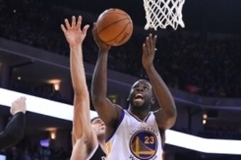November 13, 2014; Oakland, CA, USA; Golden State Warriors forward Draymond Green (23) shoots the basketball against Brooklyn Nets center Brook Lopez (11) during the third quarter at Oracle Arena. The Warriors defeated the Nets 107-99. Mandatory Credit: K