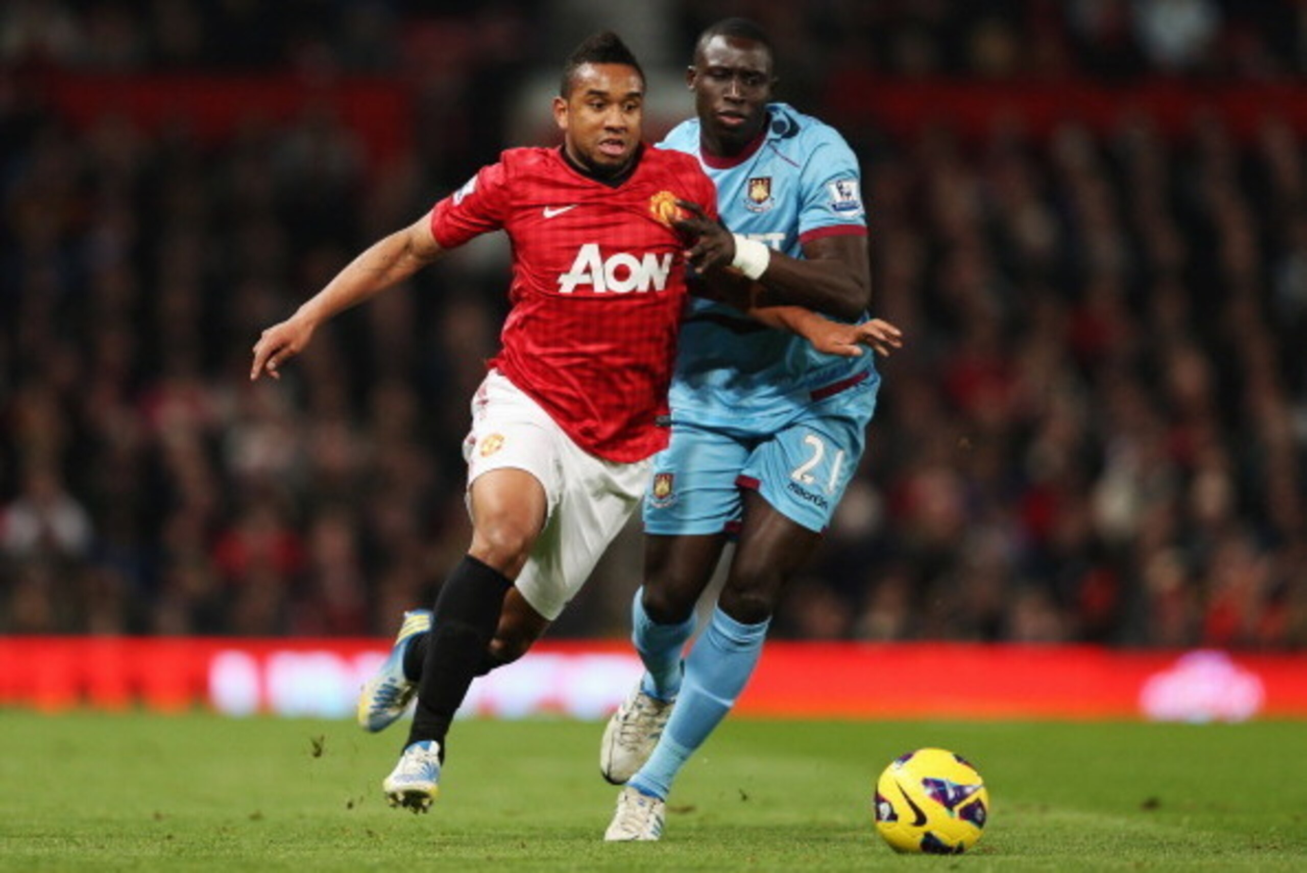 MANCHESTER, ENGLAND - NOVEMBER 28:  Anderson of Manchester United battles with Mohamed Diame of West Ham United during the Barclays Premier League match between Manchester United and West Ham United at Old Trafford on November 28, 2012 in Manchester, Engl