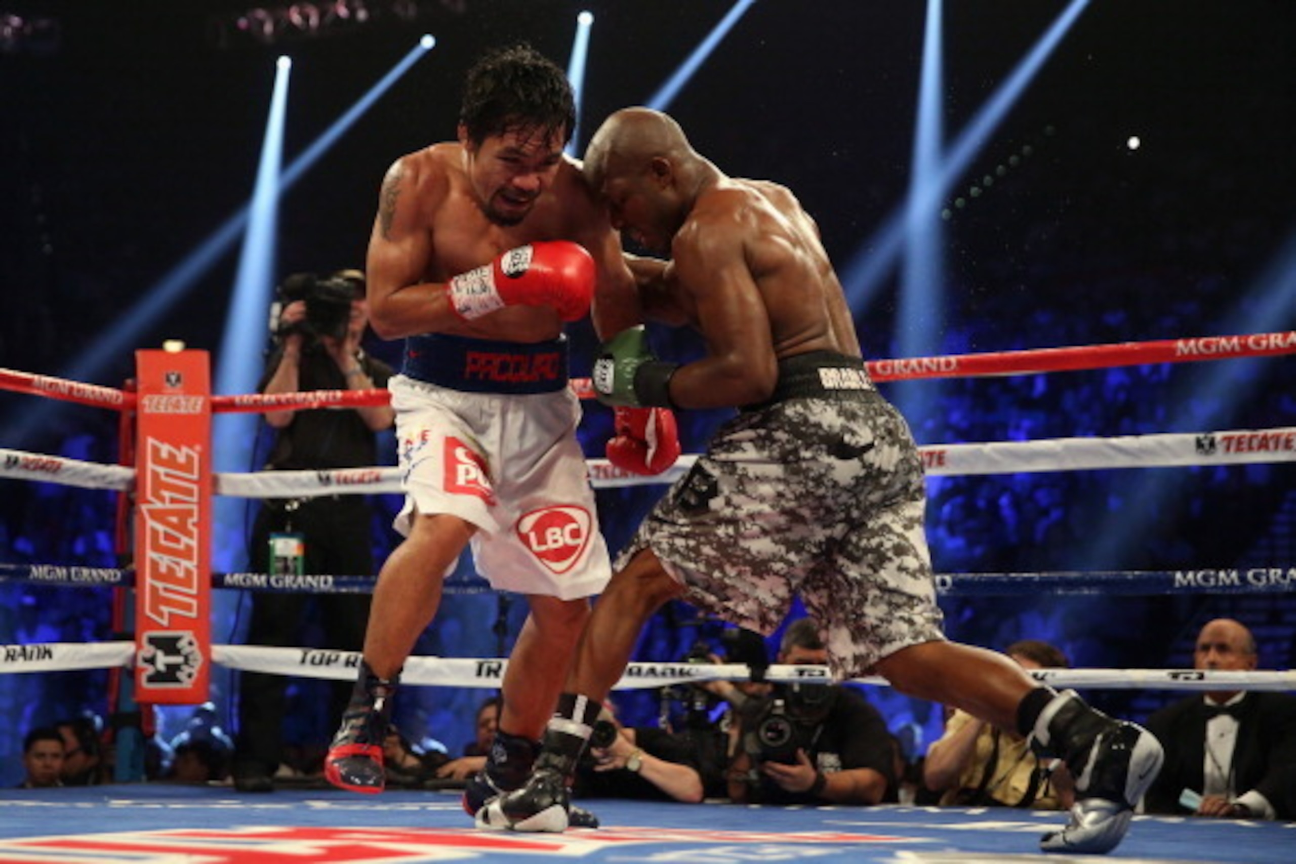 LAS VEGAS, NV - APRIL 12:  Manny Pacquiao (L) and Timothy Bradley fight at the MGM Grand Garden Arena on April 12, 2014 in Las Vegas, Nevada.  (Photo by Jeff Gross/Getty Images)