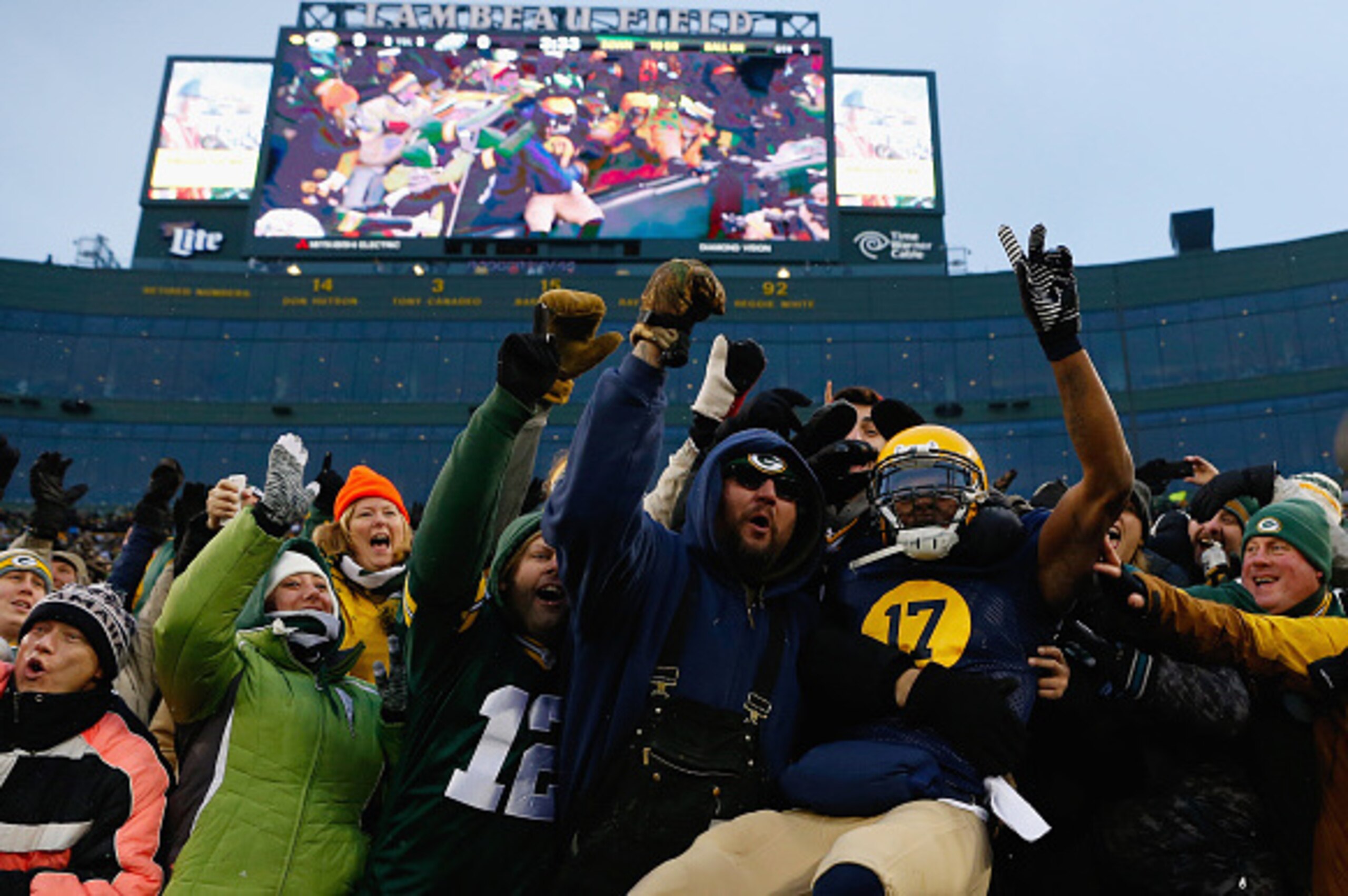 GREEN BAY, WI - NOVEMBER 16:  Davante Adams #17 of the Green Bay Packers celebrates his touchdown against the Philadelphia Eagles with fans during the first quarter of the game at Lambeau Field on November 16, 2014 in Green Bay, Wisconsin.  (Photo by Mike