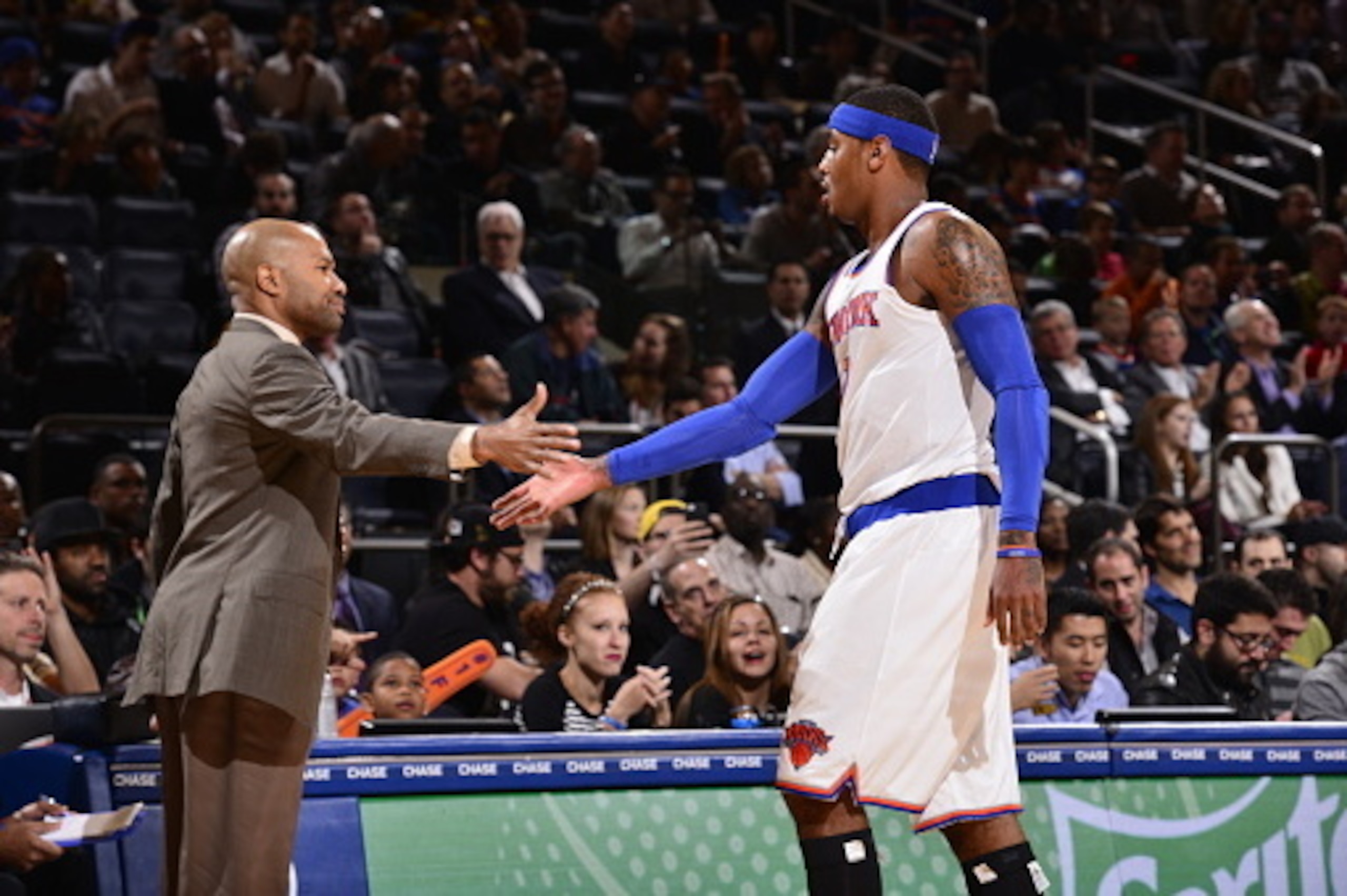 NEW YORK, NY - OCTOBER 13:  Head coach Derek Fisher of the New York Knicks shakes hands with Carmelo Anthony #7 during a game against the Toronto Raptors at Madison Square Garden on October 13, 2014 in New York City, New York. NOTE TO USER: User expressly