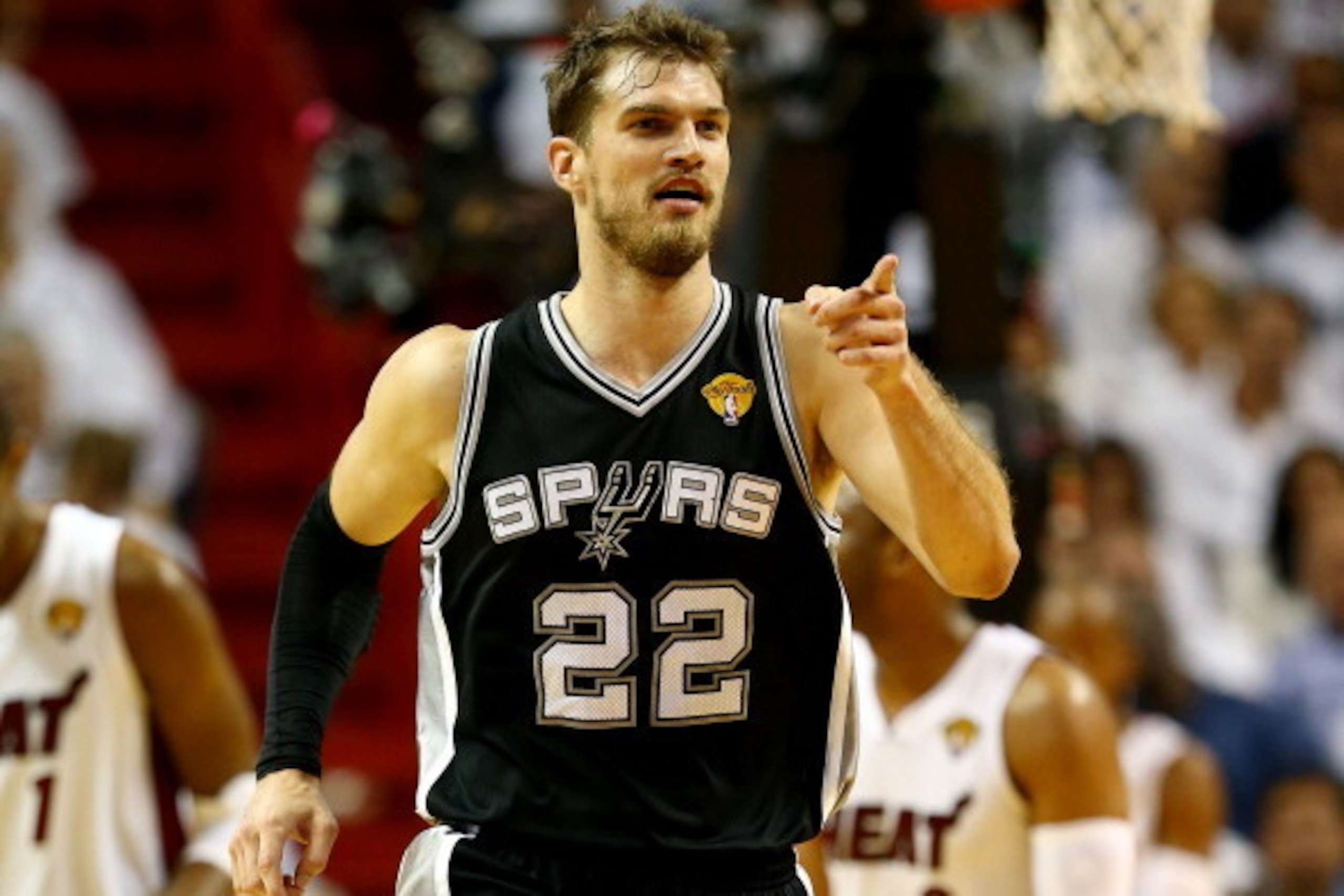 MIAMI, FL - JUNE 12:  Tiago Splitter #22 of the San Antonio Spurs reacts against the Miami Heat during Game Four of the 2014 NBA Finals at American Airlines Arena on June 12, 2014 in Miami, Florida. NOTE TO USER: User expressly acknowledges and agrees tha