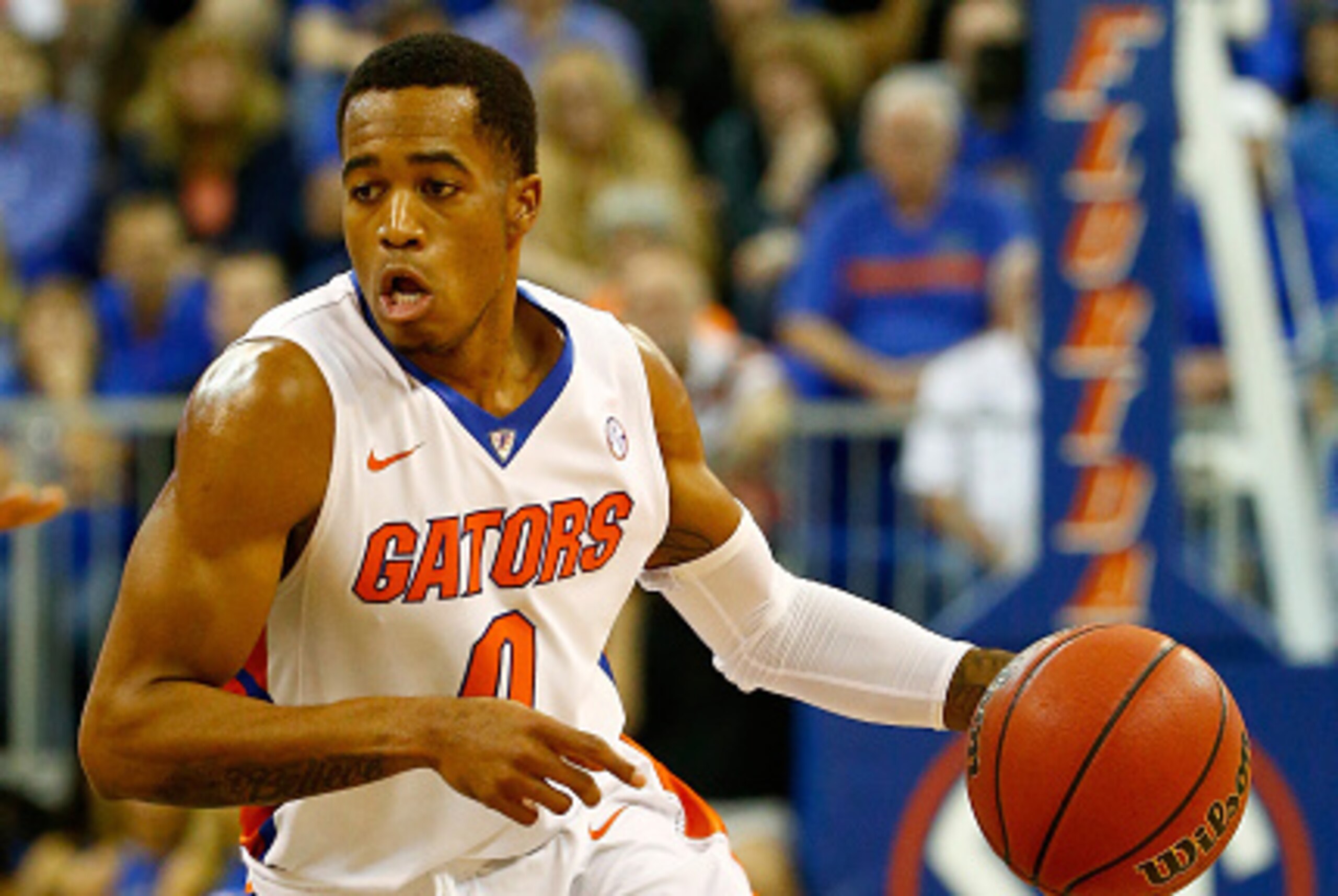 GAINESVILLE, FL - NOVEMBER 17:  Kasey Hill #0 of the Florida Gators drives to the basket during the game against the Miami (Fl) Hurricanes at Stephen C. O'Connell Center on November 17, 2014 in Gainesville, Florida.  (Photo by Sam Greenwood/Getty Images)