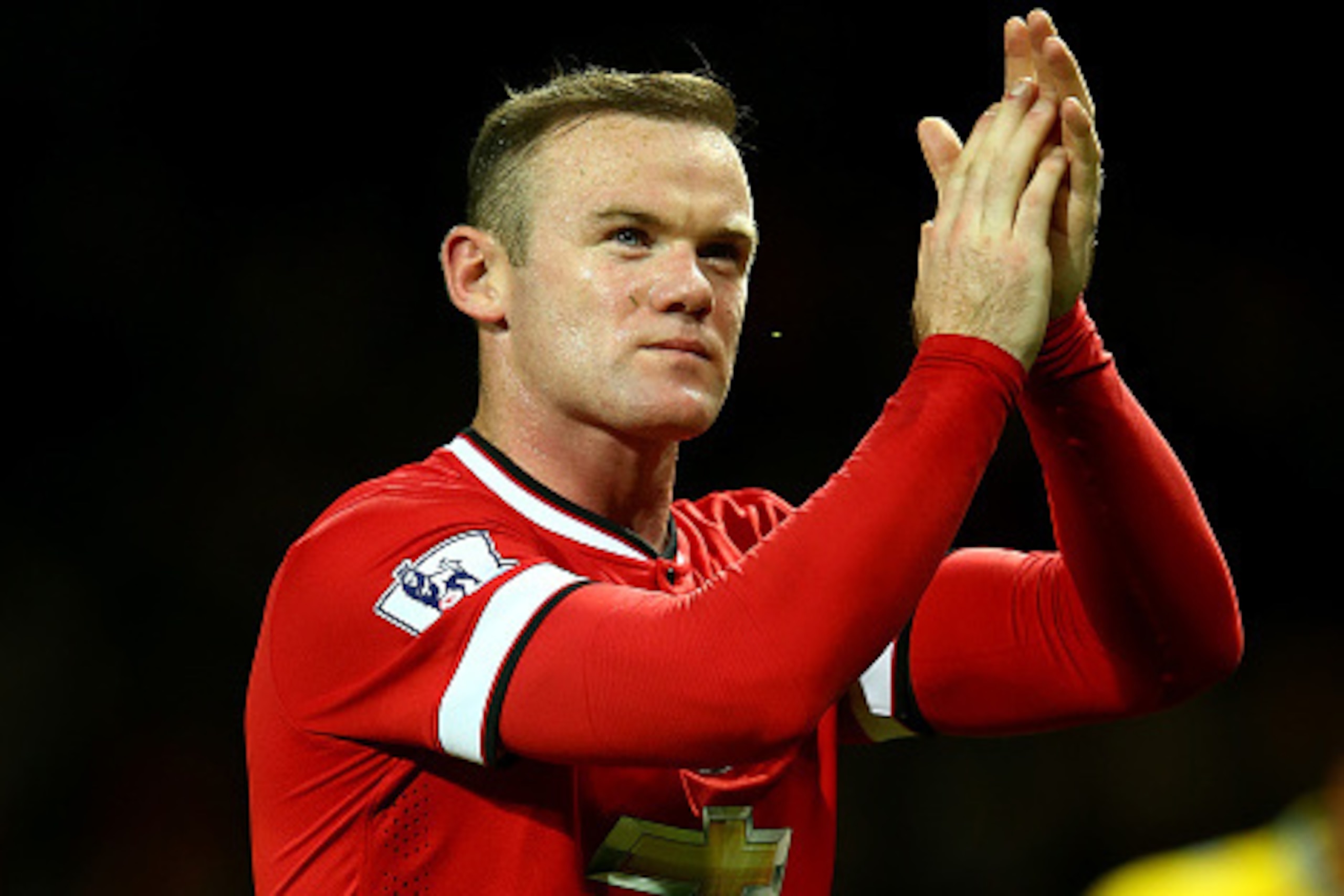 MANCHESTER, ENGLAND - NOVEMBER 08:  Wayne Rooney of Manchester United applauds the fan at the end of the Barclays Premier League match between Manchester United and Crystal Palace at Old Trafford on November 8, 2014 in Manchester, England.  (Photo by Rich