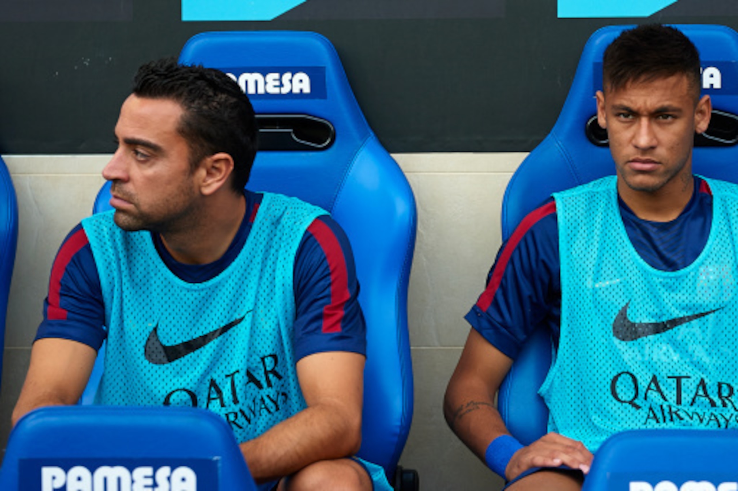 VILLARREAL, SPAIN - AUGUST 31:  Neymar Jr (R) and Xavi of Barcelona sit on the bench prior to the La Liga match between Villarreal CF and FC Barcelona at El Madrigal stadium on August 31, 2014 in Villarreal, Spain.  (Photo by Manuel Queimadelos Alonso/Get