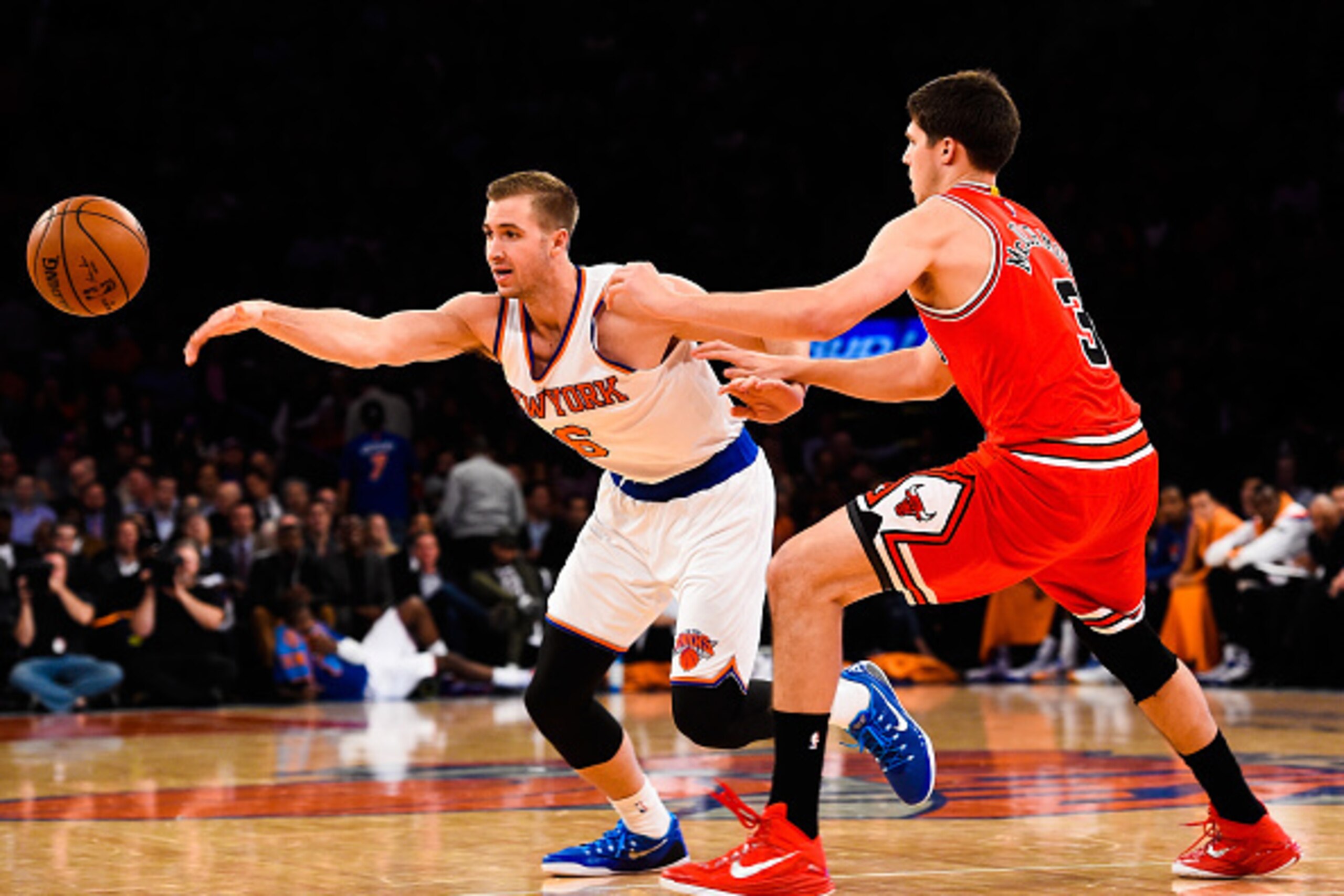 NEW YORK, NY - OCTOBER 29: Travis Wear #6 of the New York Knicks loses the ball while being guarded by Doug McDermott #3 of the Chicago Bulls in the fourth quarter during a game at Madison Square Garden on October 29, 2014 in New York City. NOTE TO USER: 