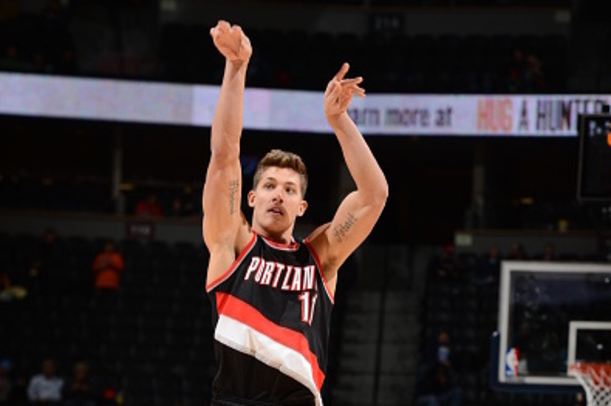 DENVER, CO - NOVEMBER 12:  Meyers Leonard #11 of the Portland Trail Blazers shoots the ball against the Denver Nuggets during the game on November 12, 2014 at the Pepsi Center in Denver, Colorado. NOTE TO USER: User expressly acknowledges and agrees that,