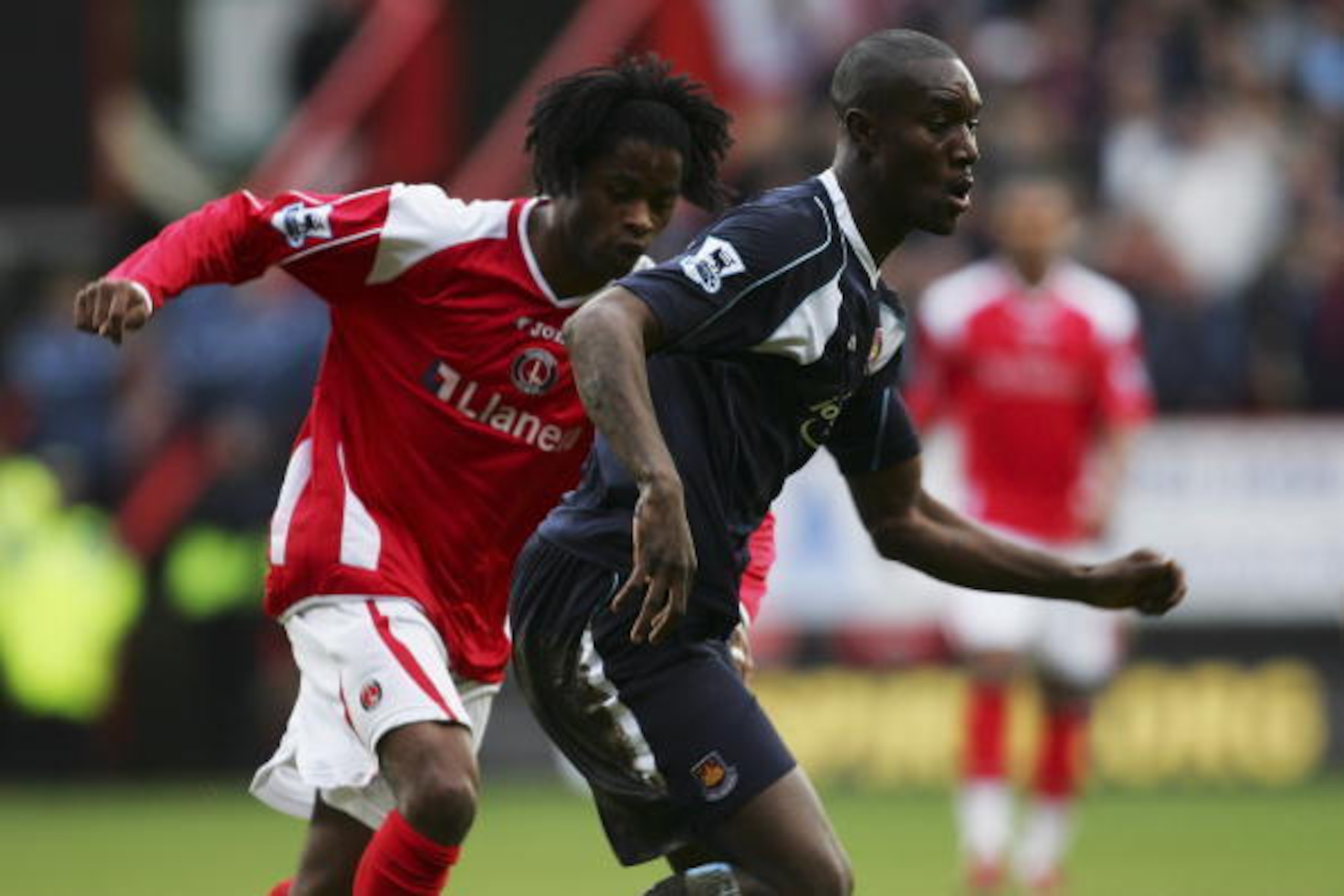LONDON - FEBRUARY 24: Carlton Cole of West Ham United evades Alexandre Song Billong of Charlton Athletic during the Barclays Premiership match between Charlton Athletic and West Ham United at The Valley on February 24, 2007 in London, England. (Photo by LONDON - FEBRUARY 24: Carlton Cole of West Ham United evades Alexandre Song Billong of Charlton Athletic during the Barclays Premiership match between Charlton Athletic and West Ham United at The Valley on February 24, 2007 in London, England. (Photo by