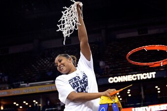 NEW ORLEANS, LA - APRIL 09:  Kaleena Mosqueda-Lewis #23 of the Connecticut Huskies, cuts down the net following a victory over the Louisville Cardinals in the National Final game of the 2013 NCAA Division I Women's Basketball Championship at New Orleans A