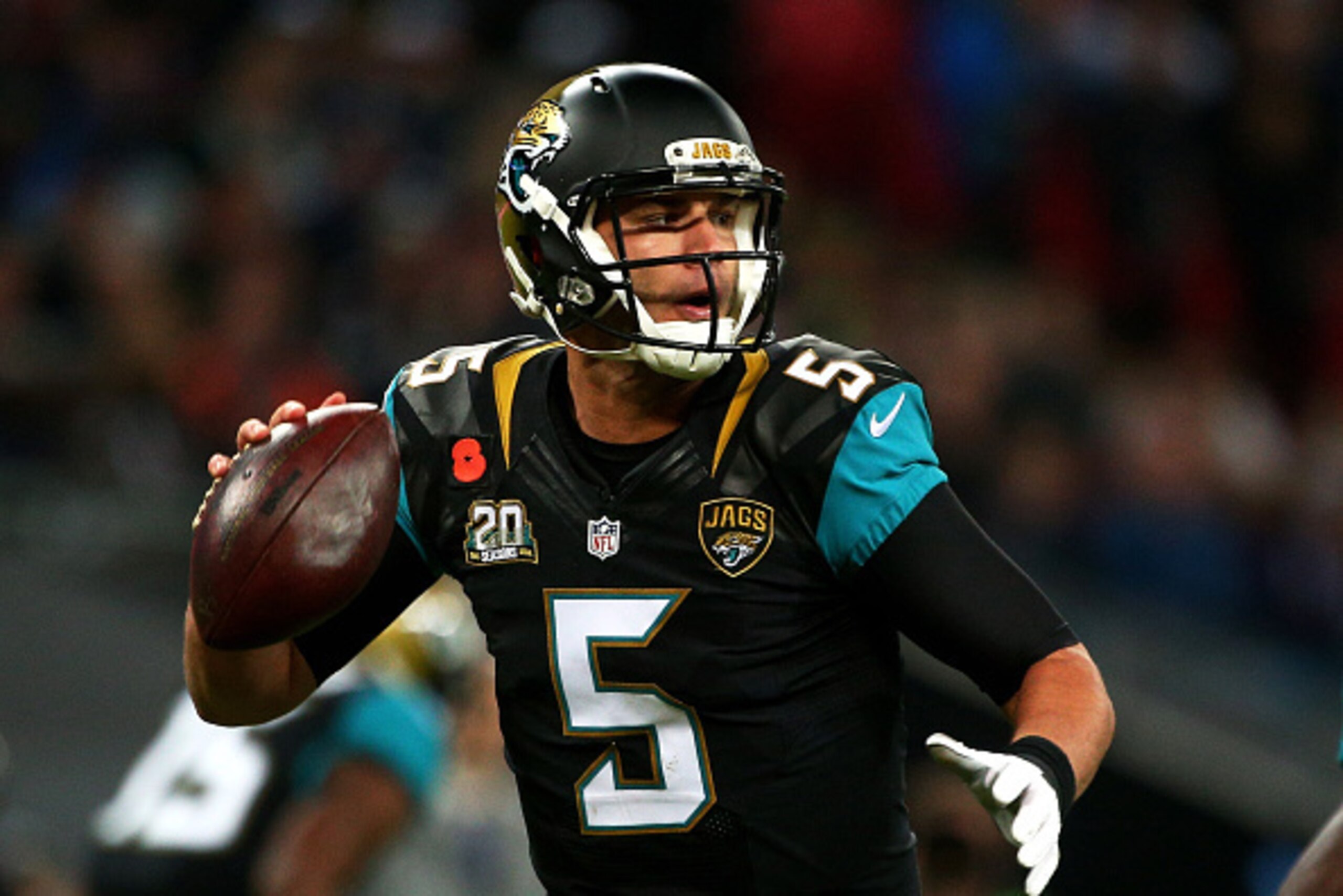 LONDON, ENGLAND - NOVEMBER 09:  Quarterback Blake Bortles #5 of the Jacksonville Jaguars looks to pass during the NFL week 10 match between the Jackson Jaguars and the Dallas Cowboys at Wembley Stadium on November 9, 2014 in London, England.  (Photo by Ch