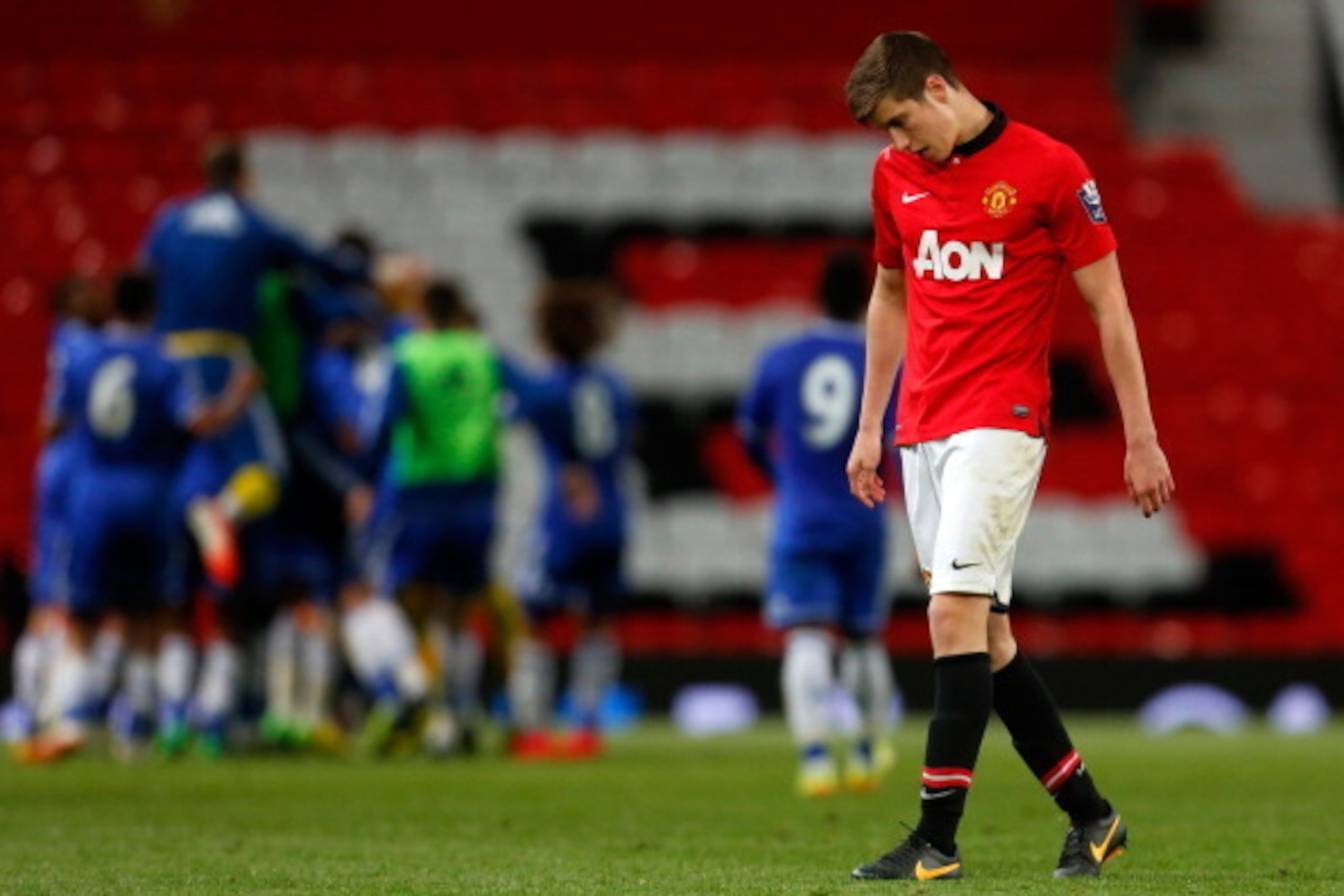 MANCHESTER, ENGLAND - MAY 14: Patrick McNair of Manchester United reacts at the final whistle during the Barclays Under-21 Premier League Final match between Manchester United and Chelsea at Old Trafford on May 14, 2014 in Manchester, England. (Photo by P