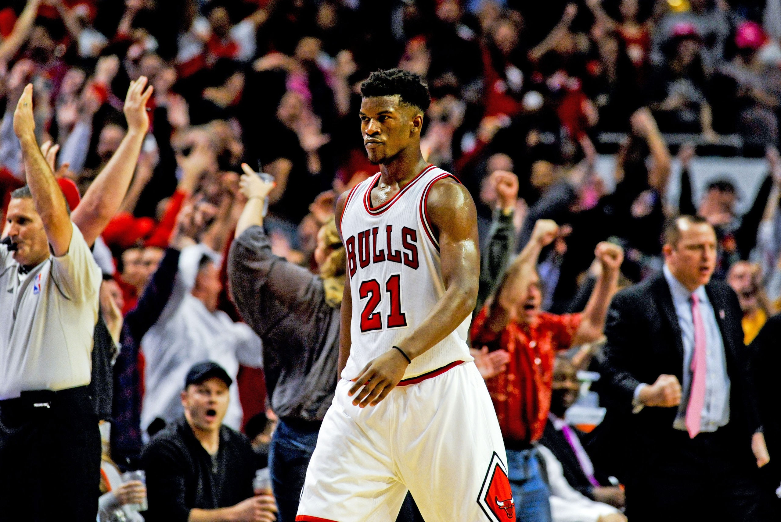 Oct 16, 2014; Chicago, IL, USA; Chicago Bulls guard Jimmy Butler (21) reacts after he shot a last second three-point basket to beat the Atlanta Hawks 85-84 during the second half at the United Center. Mandatory Credit: Matt Marton-USA TODAY Sports Oct 16, 2014; Chicago, IL, USA; Chicago Bulls guard Jimmy Butler (21) reacts after he shot a last second three-point basket to beat the Atlanta Hawks 85-84 during the second half at the United Center. Mandatory Credit: Matt Marton-USA TODAY Sports