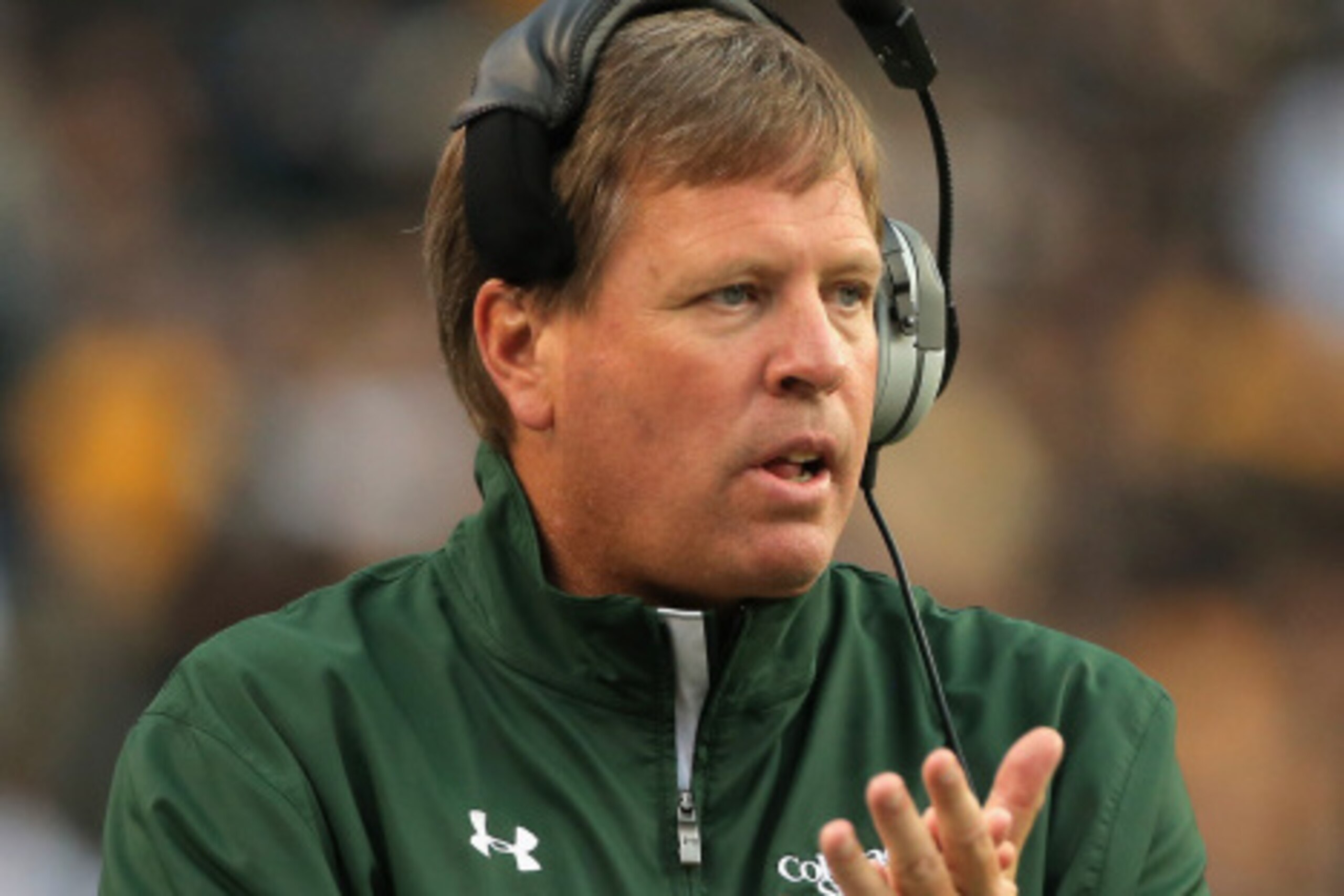 DENVER, CO - AUGUST 29:  Head coach Jim McElwain of the Colorado State Rams  leads his team against the Colorado Buffaloes in the Rocky Mountain Showdown at Sports Authority Field at Mile High on August 29, 2014 in Denver, Colorado. The Colorado State Ram
