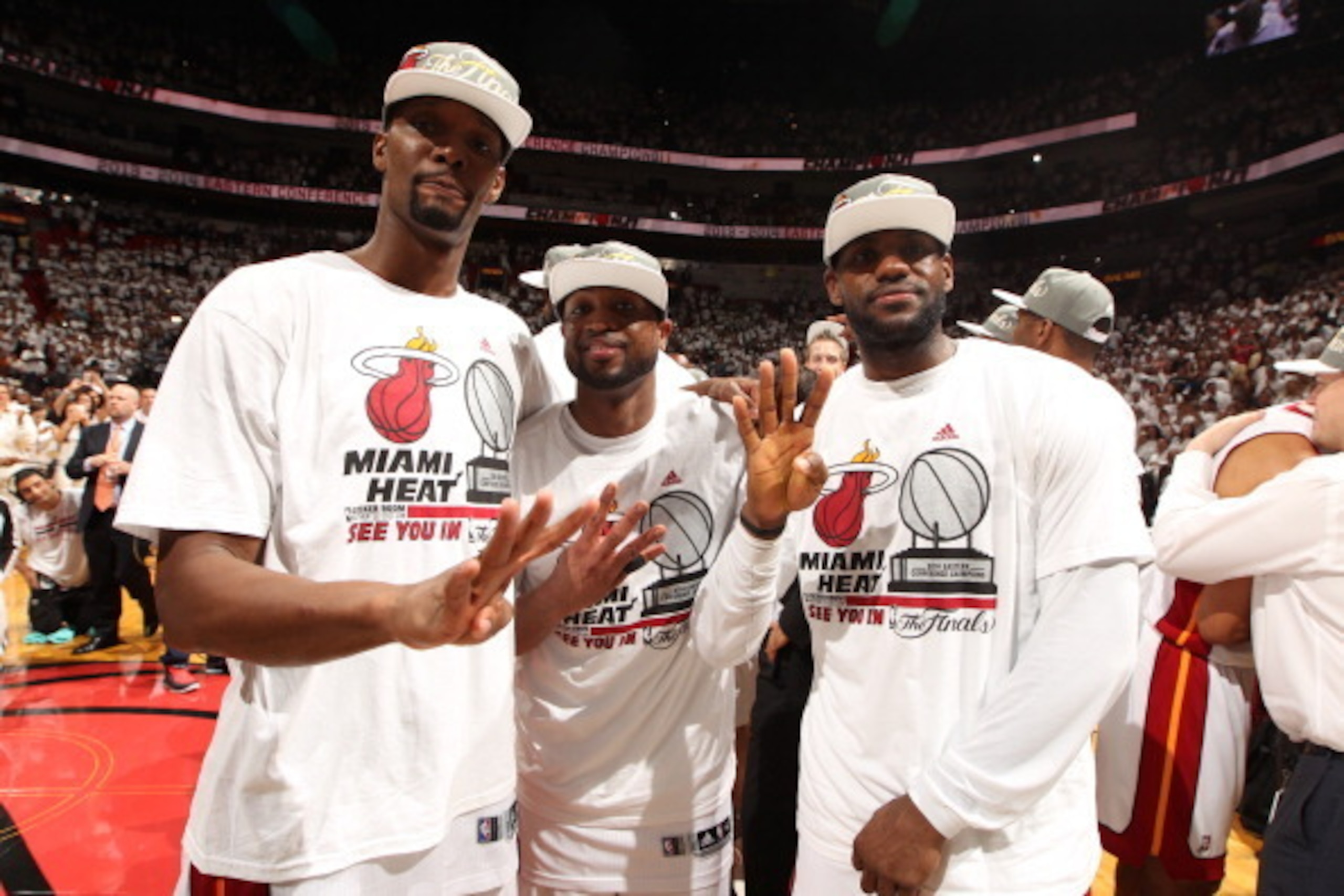 MIAMI, FL - MAY 30: Chris Bosh #1, Dwyane Wade #3, and LeBron James #6 of the Miami Heat celebrate after Game Six of the Eastern Conference Finals against the Indiana Pacers during the 2014 NBA Playoffs on May 30, 2014 in Miami, Fl. NOTE TO USER: User exp