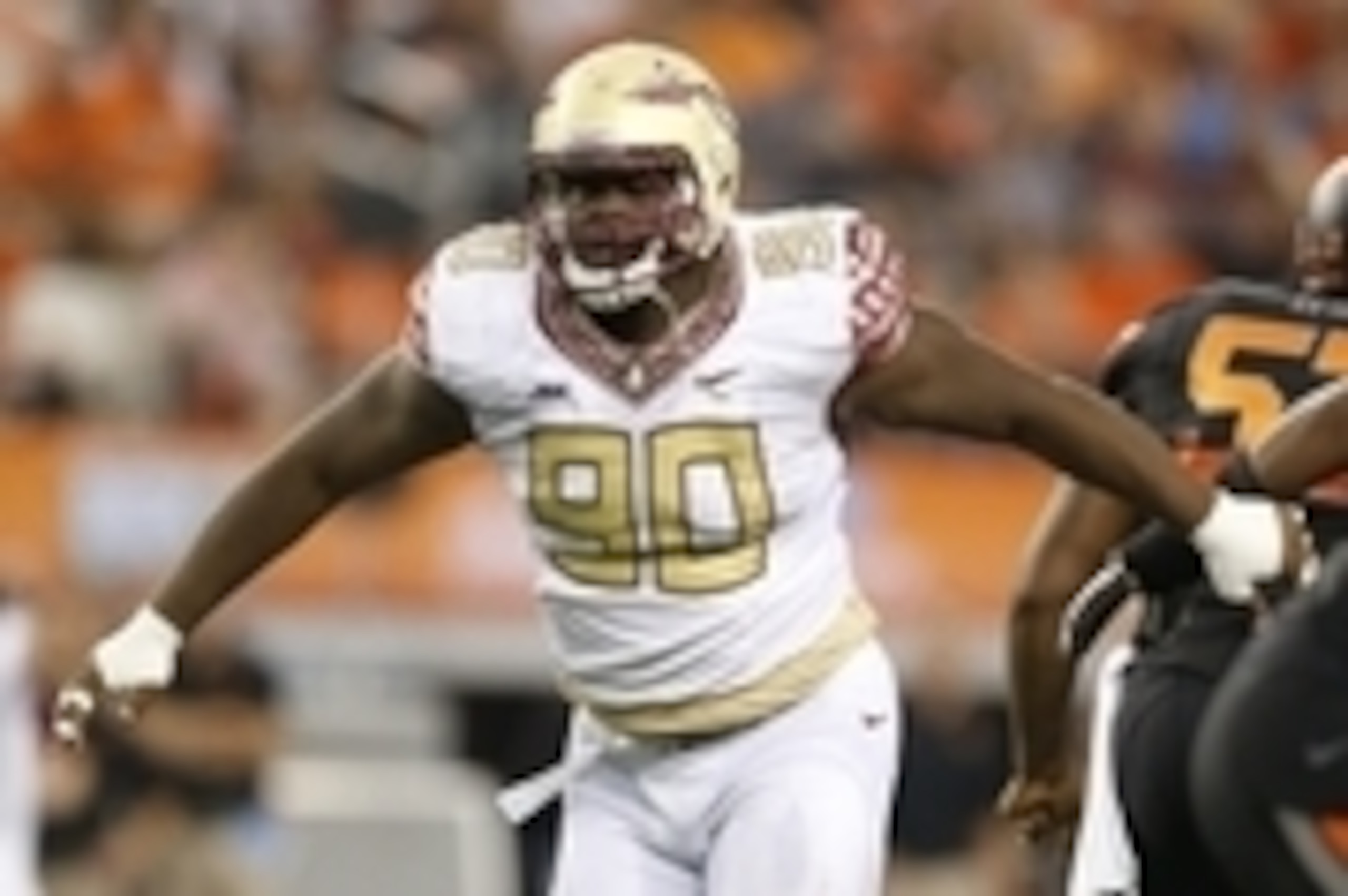 Aug 30, 2014; Arlington, TX, USA; Florida State Seminoles defensive tackle Eddie Goldman (90) in action against the Oklahoma State Cowboys at AT&T Stadium. Mandatory Credit: Matthew Emmons-USA TODAY Sports