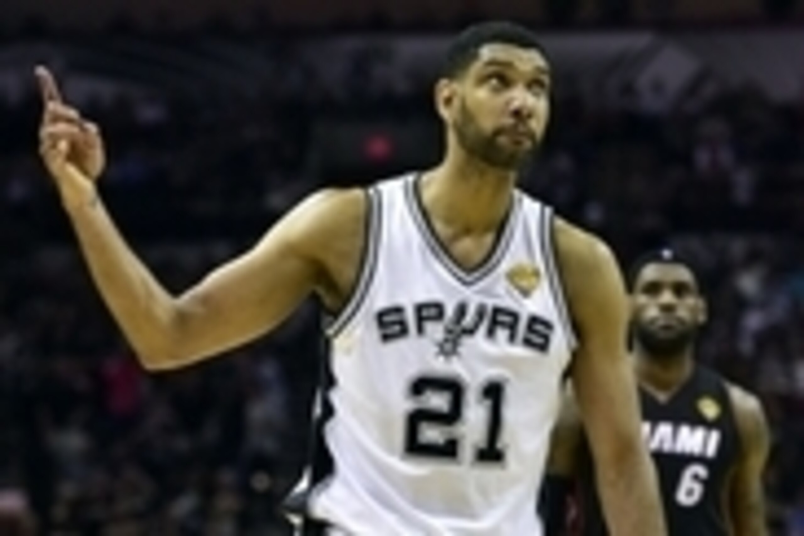 Jun 15, 2014; San Antonio, TX, USA; San Antonio Spurs forward Tim Duncan (21) reacts to a play in front of Miami Heat forward LeBron James (6) during the third quarter in game five of the 2014 NBA Finals at AT&T Center. Mandatory Credit: Bob Donnan-USA TO