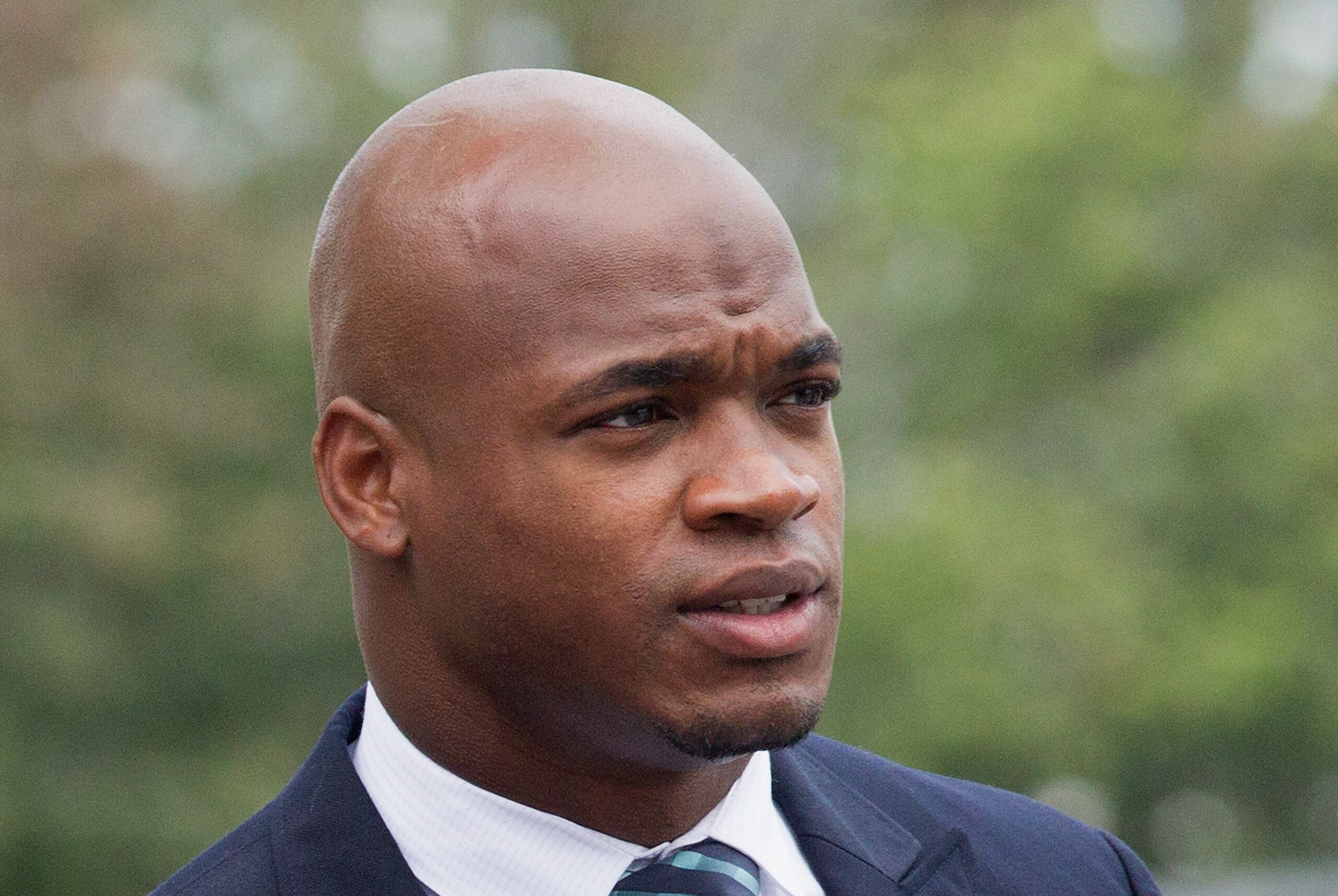 CONROE, TX - NOVEMBER 04:  Football running back Adrian Peterson of the Minnesota Vikings arrives for a court hearing on charges of child abuse at the Montgomery County Courthouse on November 4, 2014 in Conroe, Texas. Peterson entered a no contest plea an