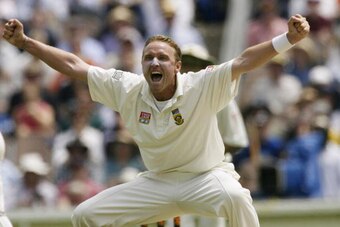 28 Dec 2001:  Allan Donald of South Africa celebrates after taking the wicket of Justin Langer of Australia, caught by Lance Klusener for 85, during day three of the second Test between Australia and South Africa, played at the Melbourne Cricket Ground,Me