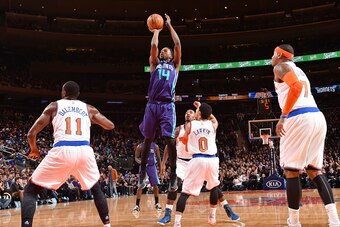 NEW YORK, NY - NOVEMBER 2: Michael Kidd-Gilchrist #14 of the Charlotte Hornets shoots against the New York Knicks during the game on November 2, 2014 at Madison Square Garden in New York City, New York. NOTE TO USER: User expressly acknowledges and agrees