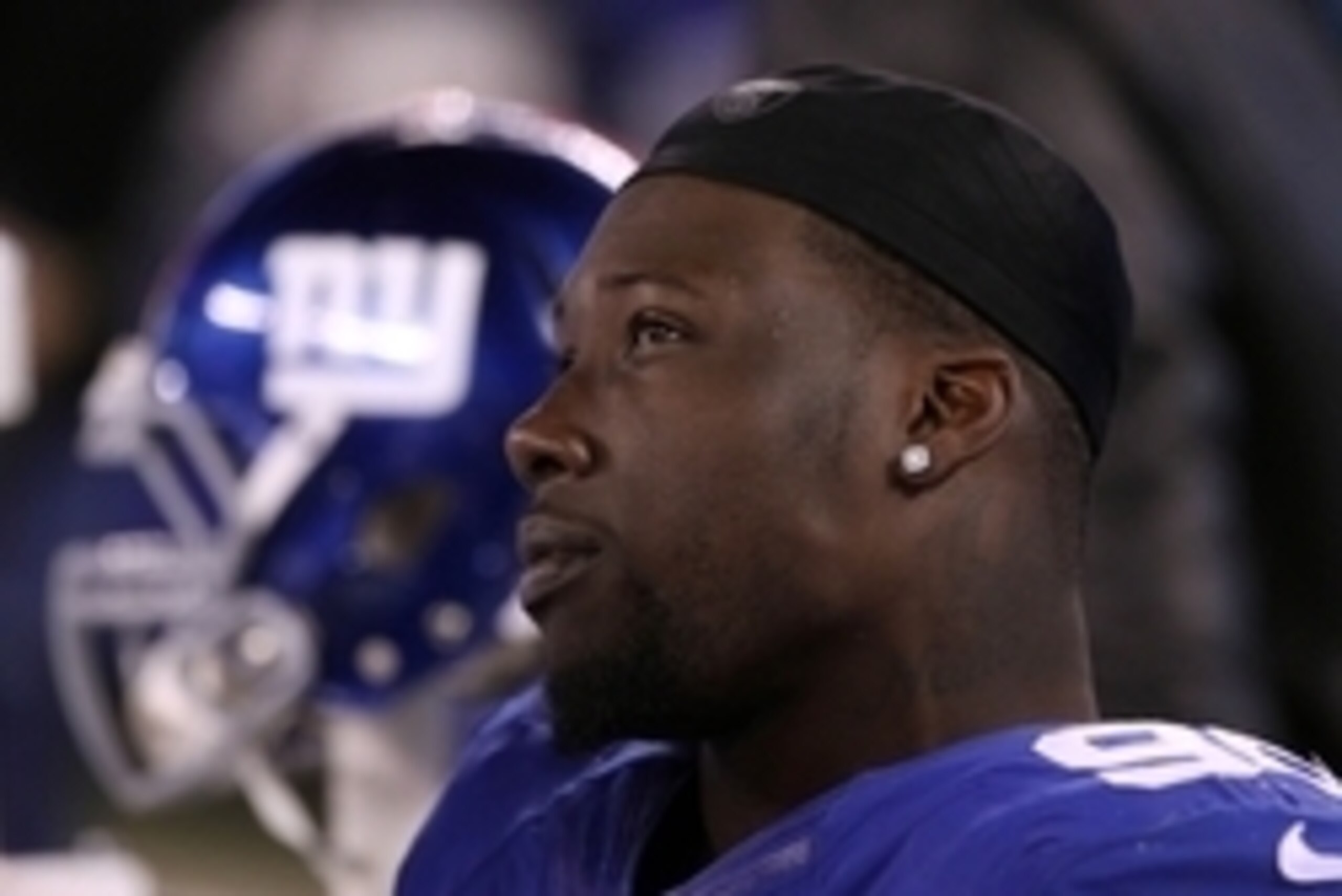 Nov 3, 2014; East Rutherford, NJ, USA; New York Giants defensive end Jason Pierre-Paul (90) sits on the bench during second half against the Indianapolis Colts at MetLife Stadium. Mandatory Credit: Noah K. Murray-USA TODAY Sports Nov 3, 2014; East Rutherford, NJ, USA; New York Giants defensive end Jason Pierre-Paul (90) sits on the bench during second half against the Indianapolis Colts at MetLife Stadium. Mandatory Credit: Noah K. Murray-USA TODAY Sports