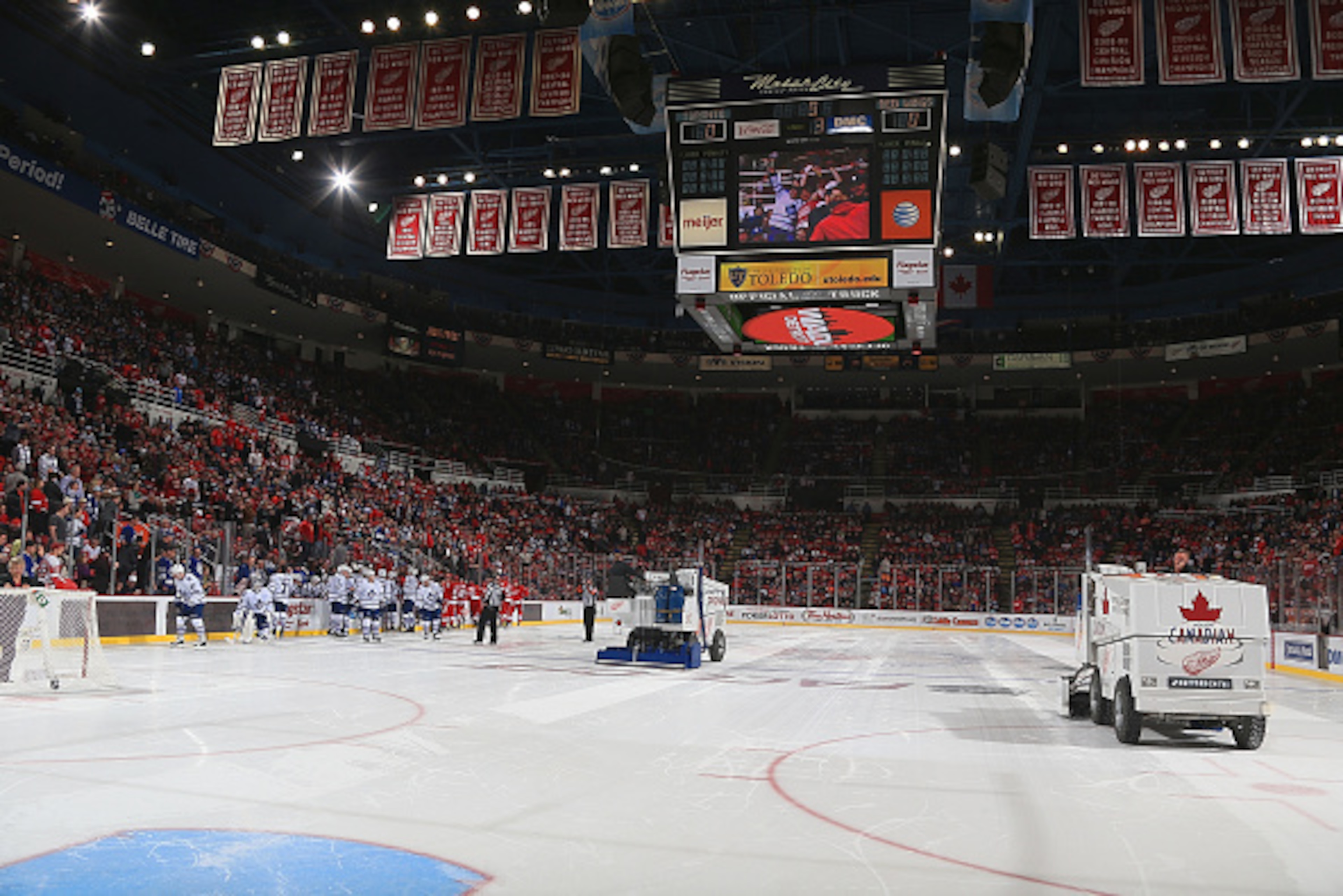 DETROIT, MI - OCTOBER 18: The Zambonis dry scrape the ice before the start of O.T. during a NHL game between the Detroit Red Wings and the Toronto Maple Leafs on October 18, 2014 at Joe Louis Arena in Detroit, Michigan. The Wings won 1-0 in OT (Dave Regin DETROIT, MI - OCTOBER 18: The Zambonis dry scrape the ice before the start of O.T. during a NHL game between the Detroit Red Wings and the Toronto Maple Leafs on October 18, 2014 at Joe Louis Arena in Detroit, Michigan. The Wings won 1-0 in OT (Dave Regin