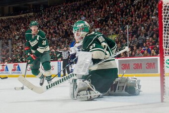 ST. PAUL, MN - DECEMBER 31: Josh Harding #37 of the Minnesota Wild makes a save against the St. Louis Blues during the game on December 31, 2013 at the Xcel Energy Center in St. Paul, Minnesota. (Photo by Bruce Kluckhohn/NHLI via Getty Images)