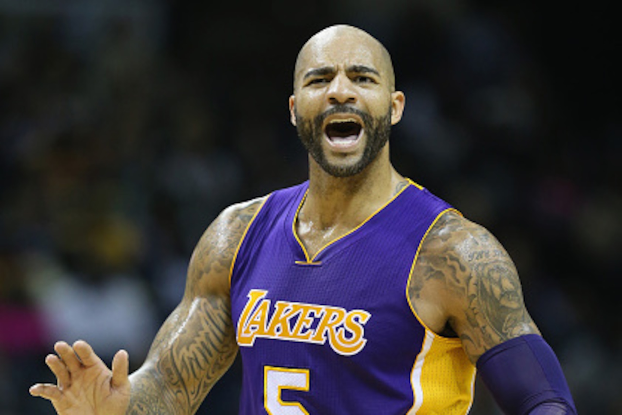 MEMPHIS, TN - NOVEMBER 11:  Carlos Boozer #5  of the Los Angeles Lakes reacts after being charged with a foul during the game against the Memphis Grizzlies at FedExForum on November 11, 2014 in Memphis, Tennessee.  (Photo by Andy Lyons/Getty Images)