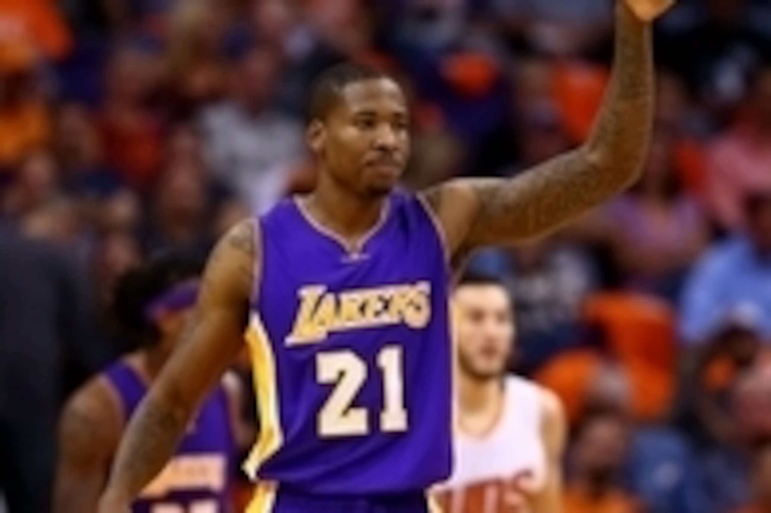 Oct 29, 2014; Phoenix, AZ, USA; Los Angeles Lakers forward Ed Davis (21) against the Phoenix Suns during the home opener at US Airways Center. The Suns defeated the Lakers 119-99. Mandatory Credit: Mark J. Rebilas-USA TODAY Sports