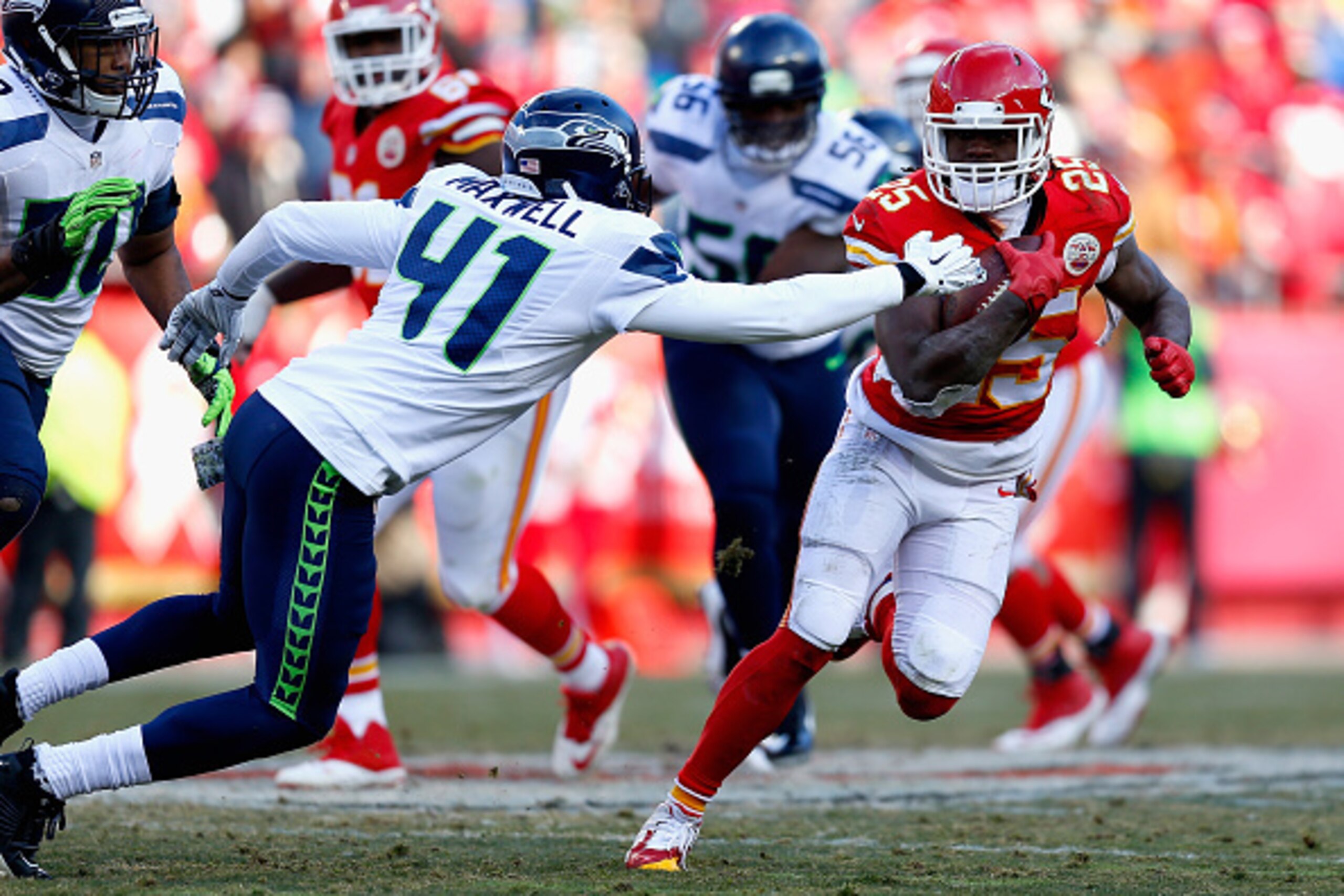 KANSAS CITY, MO - NOVEMBER 16:   Jamaal Charles #25 of the Kansas City Chiefs runs the ball against  Byron Maxwell #41 of the Seattle Seahawks during the game at Arrowhead Stadium on November 16, 2014 in Kansas City, Missouri.  (Photo by Wesley Hitt/Getty
