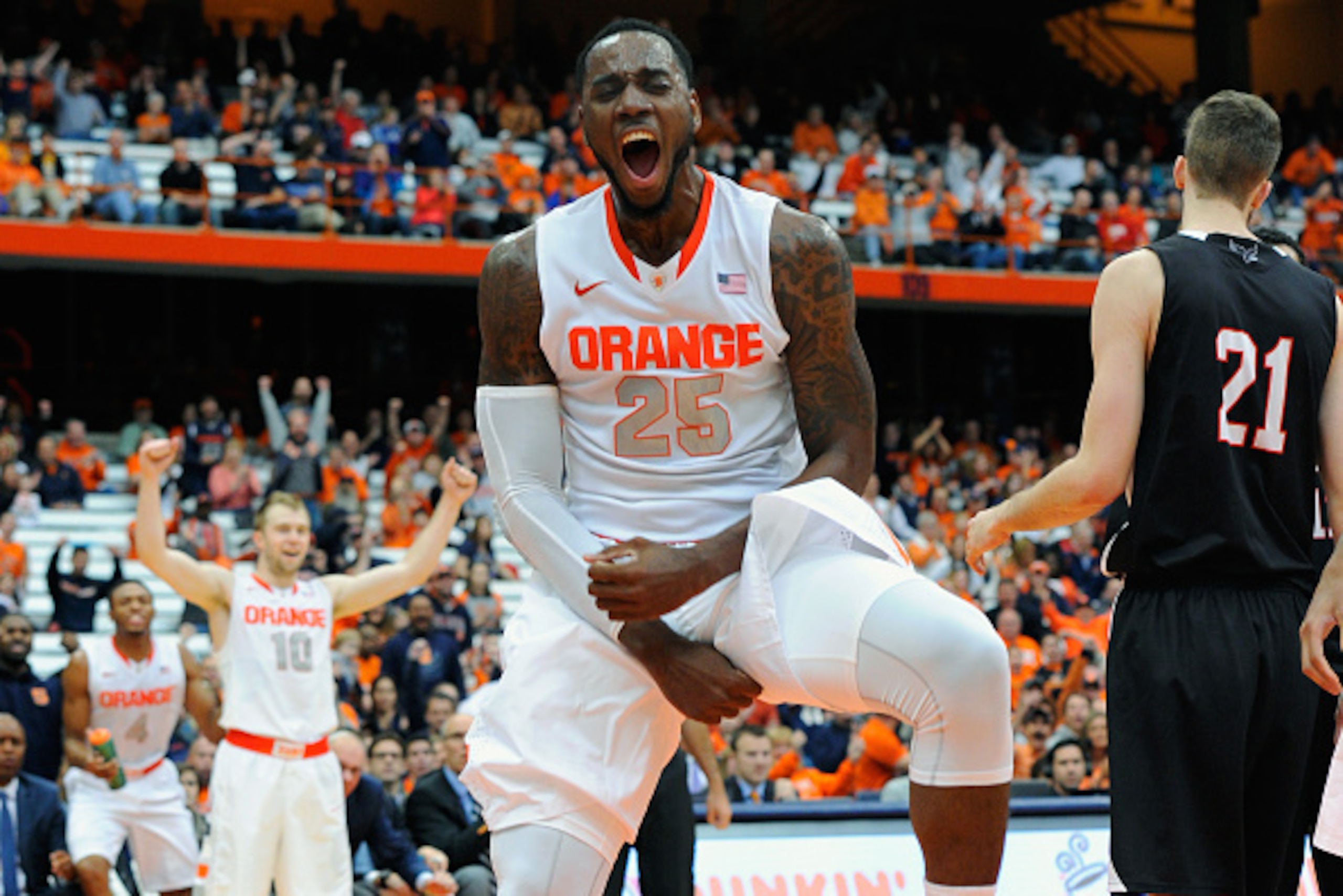 SYRACUSE, NY - NOVEMBER 02:  Rakeem Christmas #25 of the Syracuse Orange reacts to a dunk against the Carleton Ravens during the second half at the Carrier Dome on November 2, 2014 in Syracuse, New York.  Syracuse defeated Carleton 76-68.  (Photo by Rich 