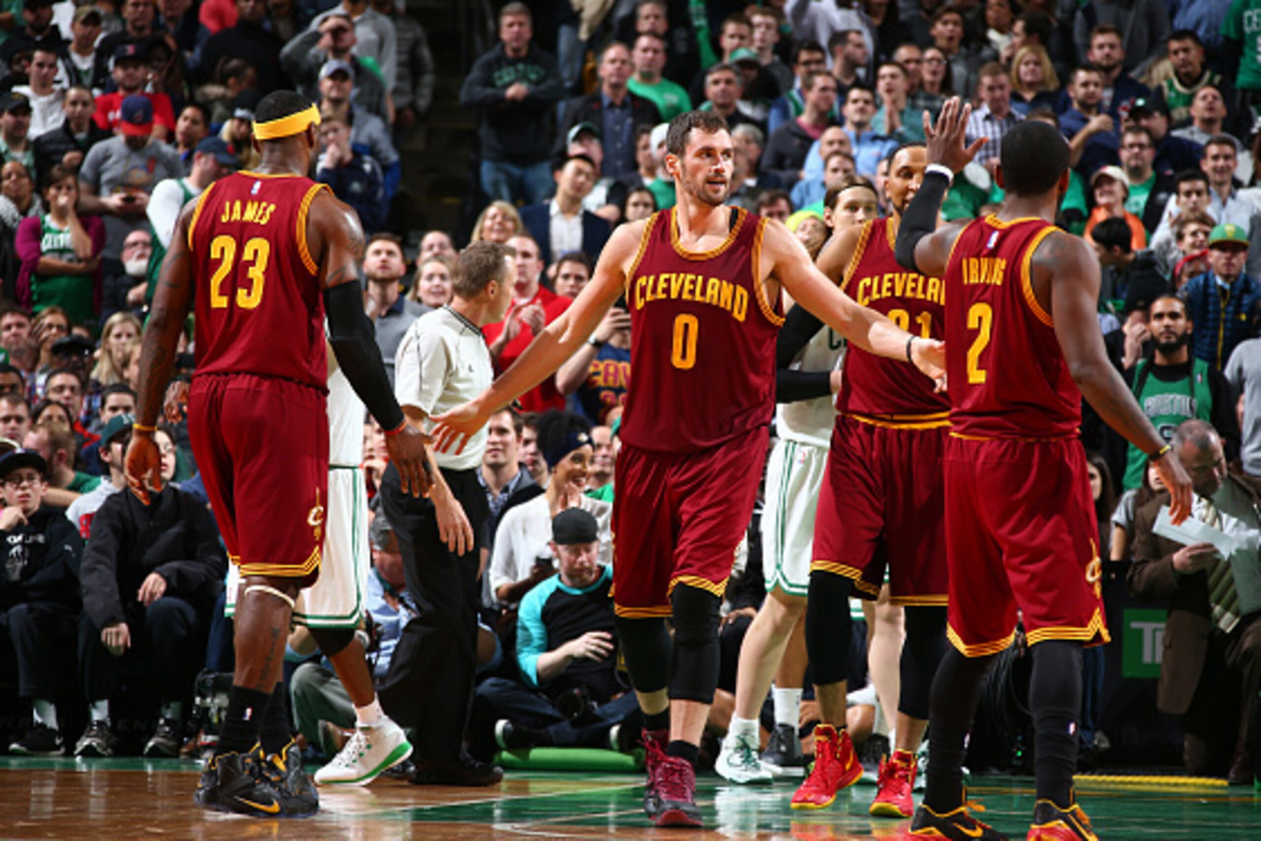 BOSTON, MA - NOVEMBER 14:  LeBron James #23 Kevin Love #0 and Kyrie Irving #2 of the Cleveland Cavaliers during the game against the Boston Celtics on November 14, 2014 at the TD Garden in Boston, Massachusetts. NOTE TO USER: User expressly acknowledges a